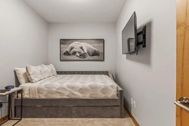 Bed in Spring Creek Condo by Canadian Rockies Vacation Rentals