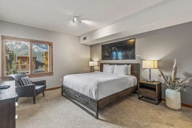 Bed in Spring Creek Condo by Canadian Rockies Vacation Rentals