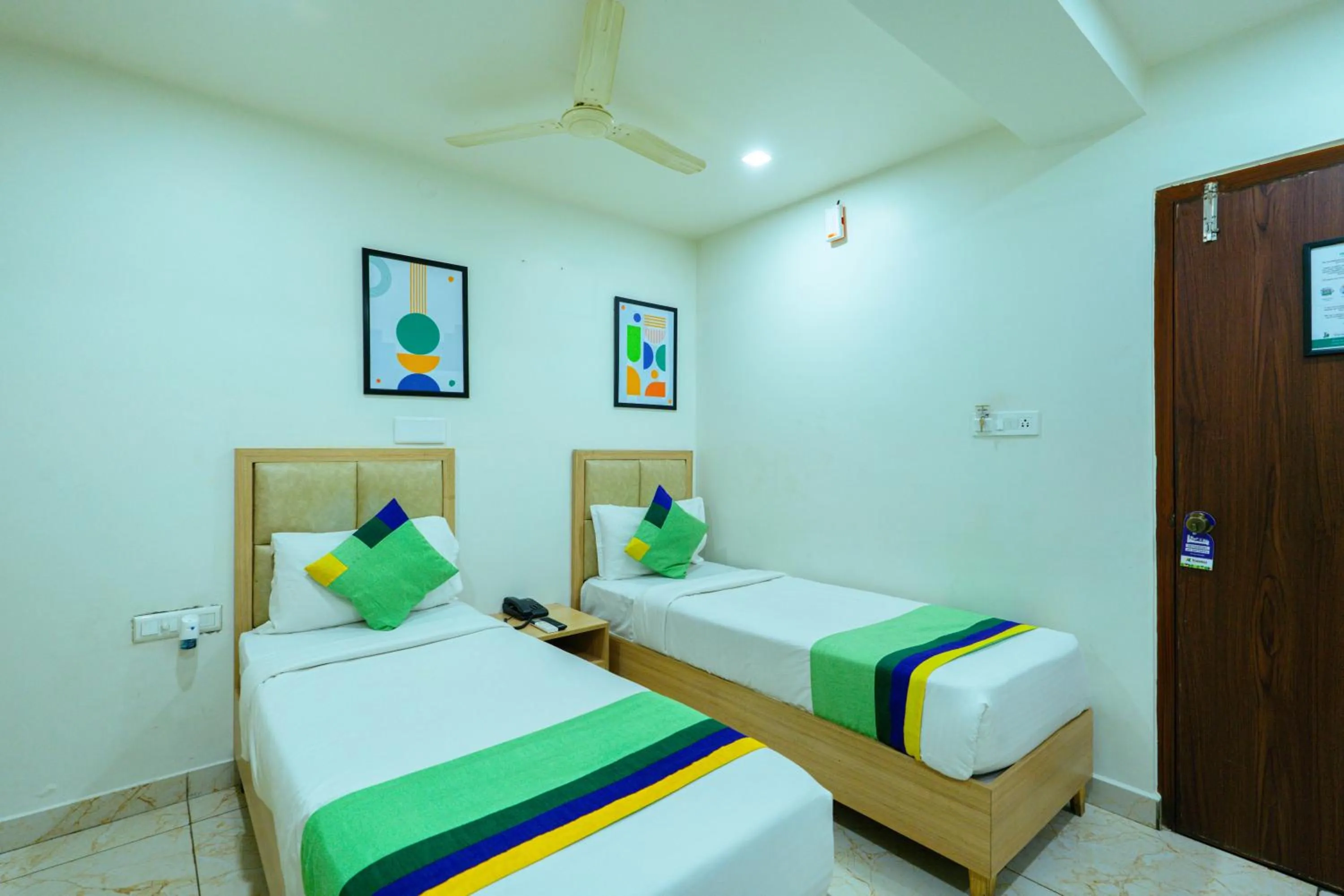 Bedroom, Bed in Treebo Elmas Grand