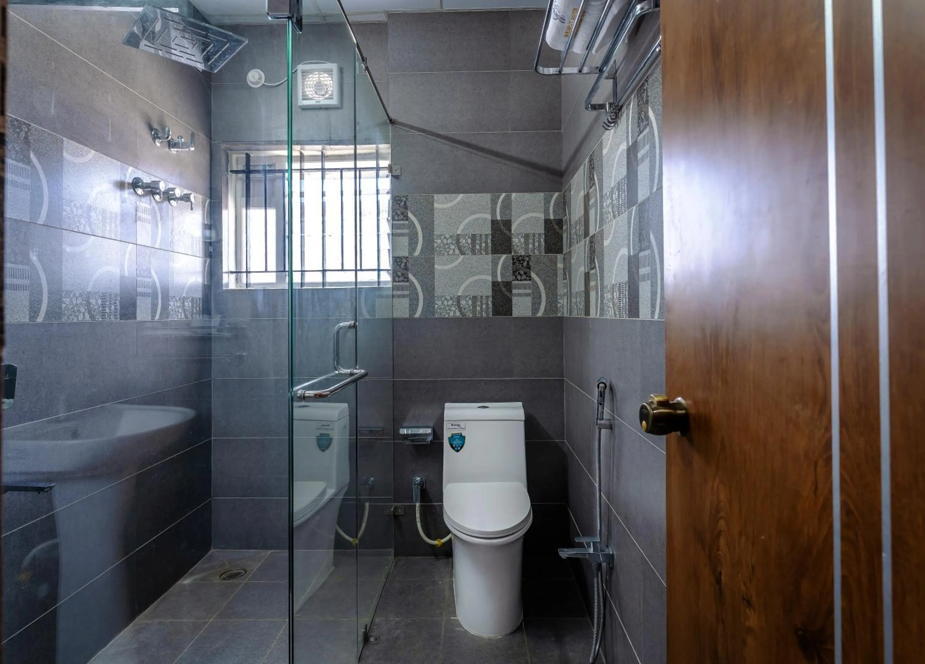 Shower in Royal Tusker Luxury Service Apartments