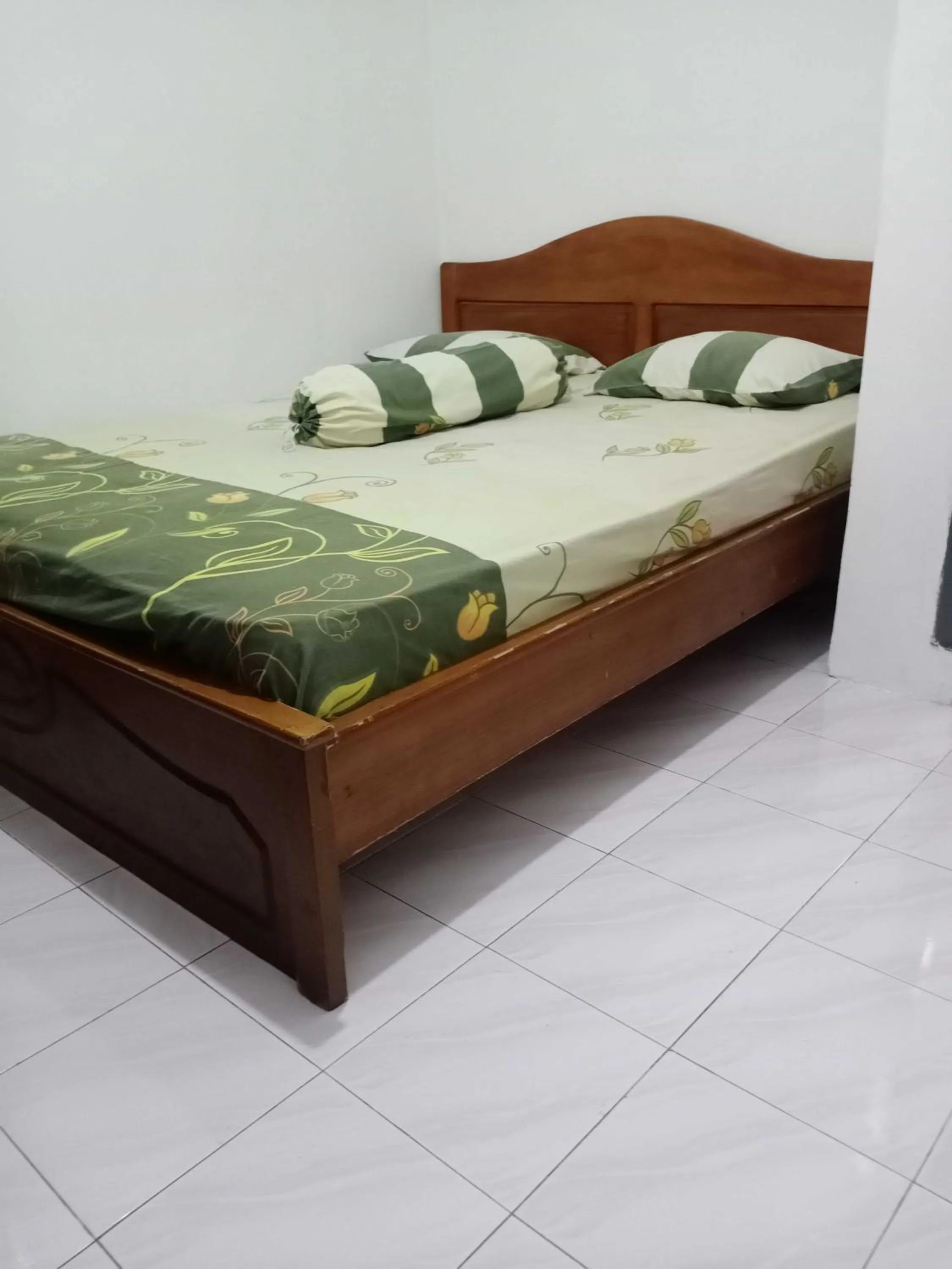Bedroom in SPOT ON 91597 Sharie Homestay Syariah