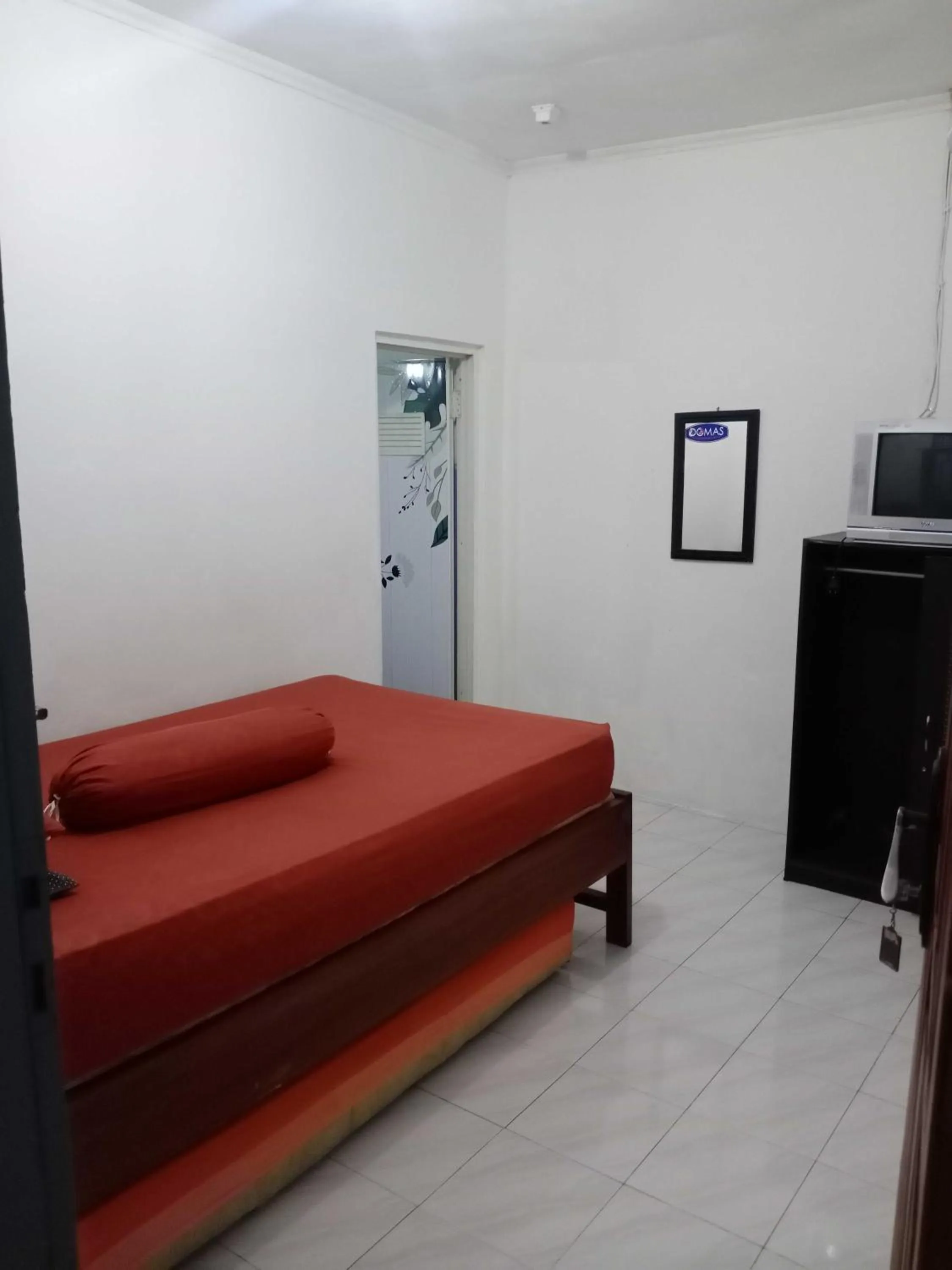 Bedroom in SPOT ON 91597 Sharie Homestay Syariah