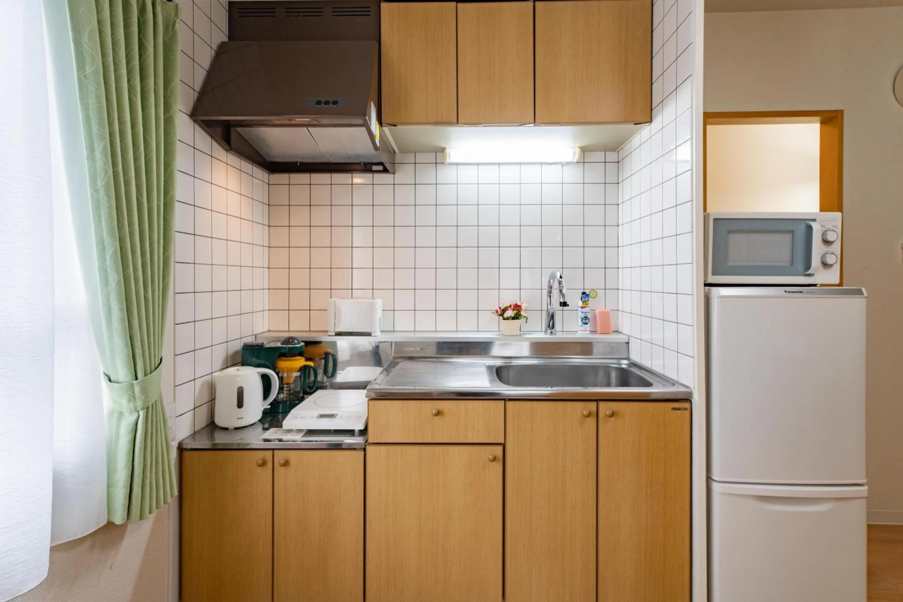 Kitchen or kitchenette in Sapporo Residential Juno