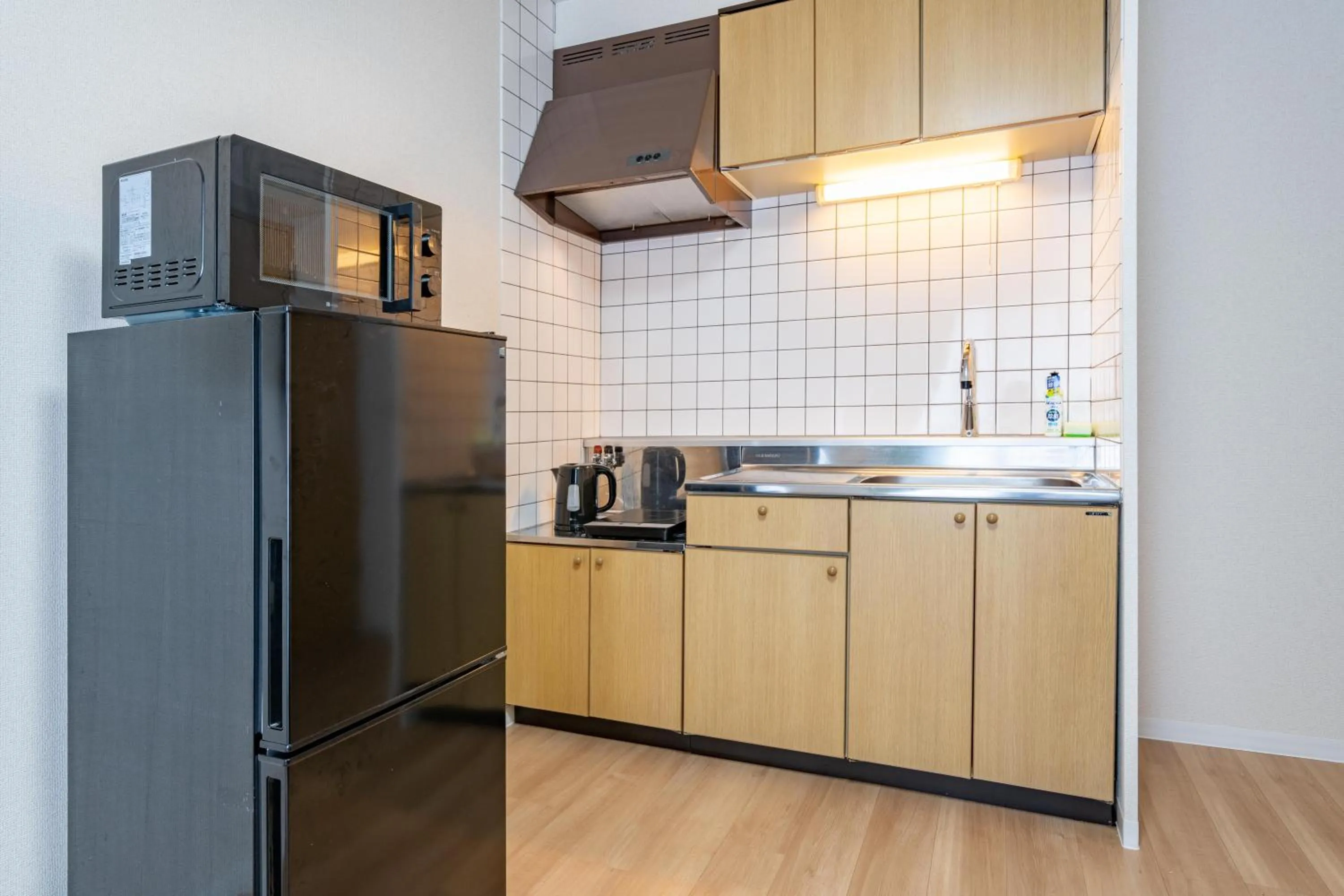 kitchen in Sapporo Residential Juno