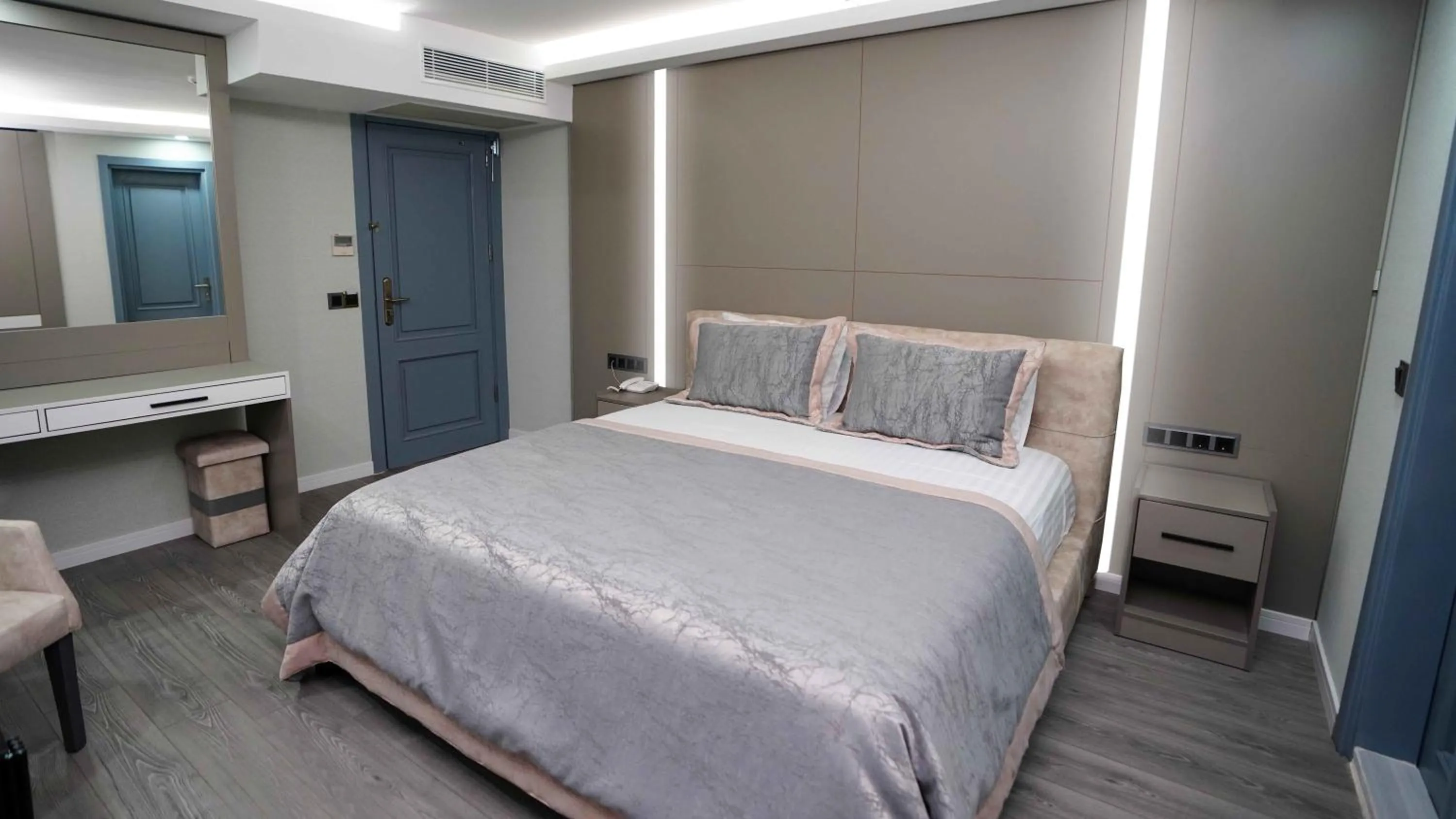 Bed in AURA MARINA HOTEL