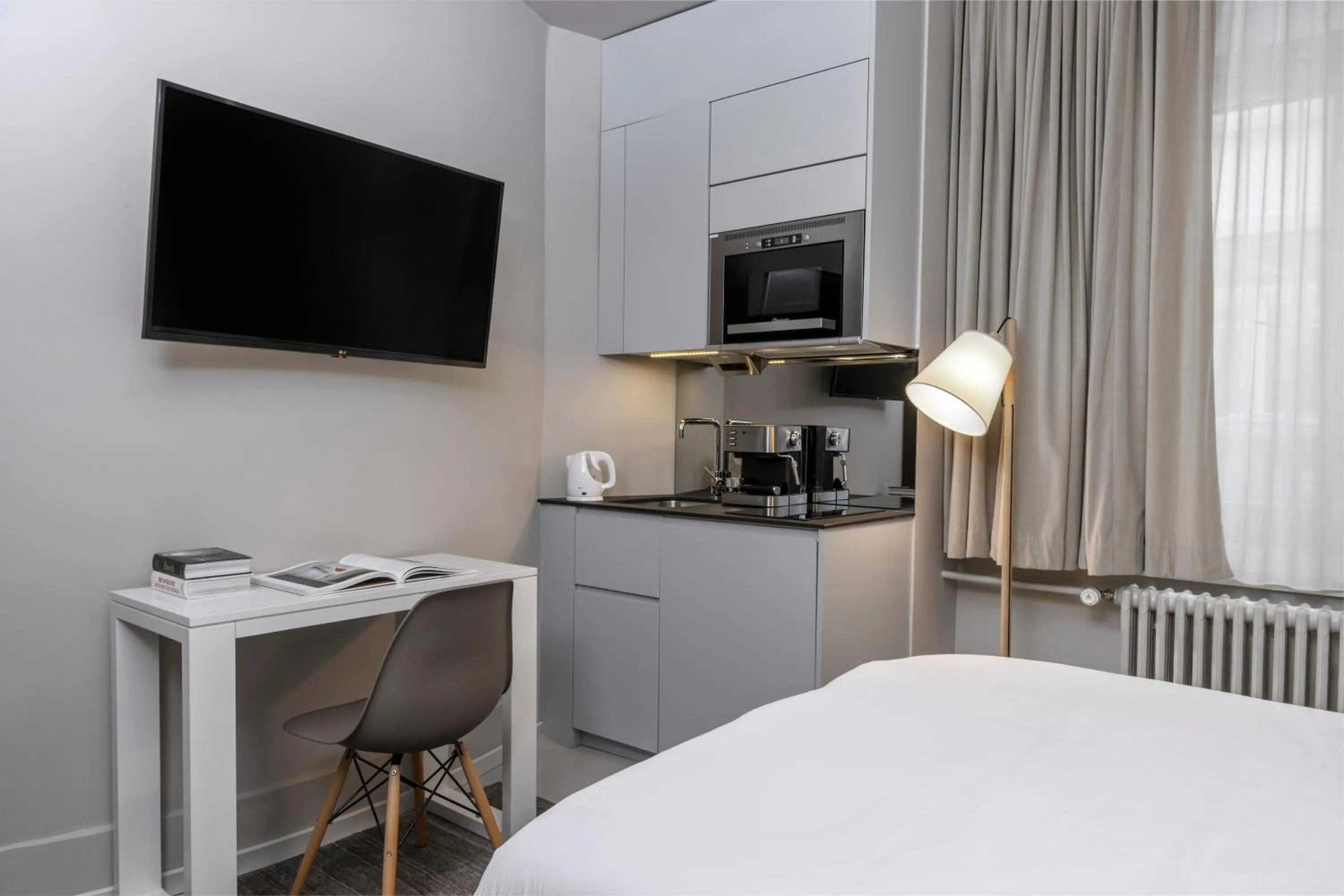 Living room, Bed in VISIONAPARTMENTS Brandschenkestrasse