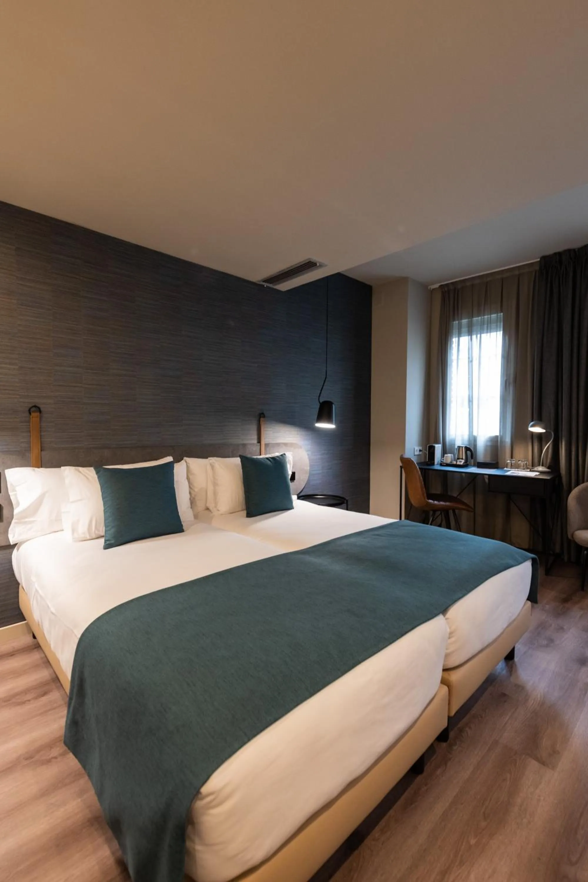 Bed in Atenea Rekord Suites Barcelona