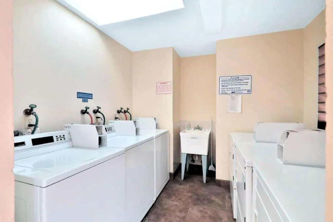 laundry in Welcome to Oasis #21 Your Coastal Retreat in Daytona Beach Shores-Walk To The Beach