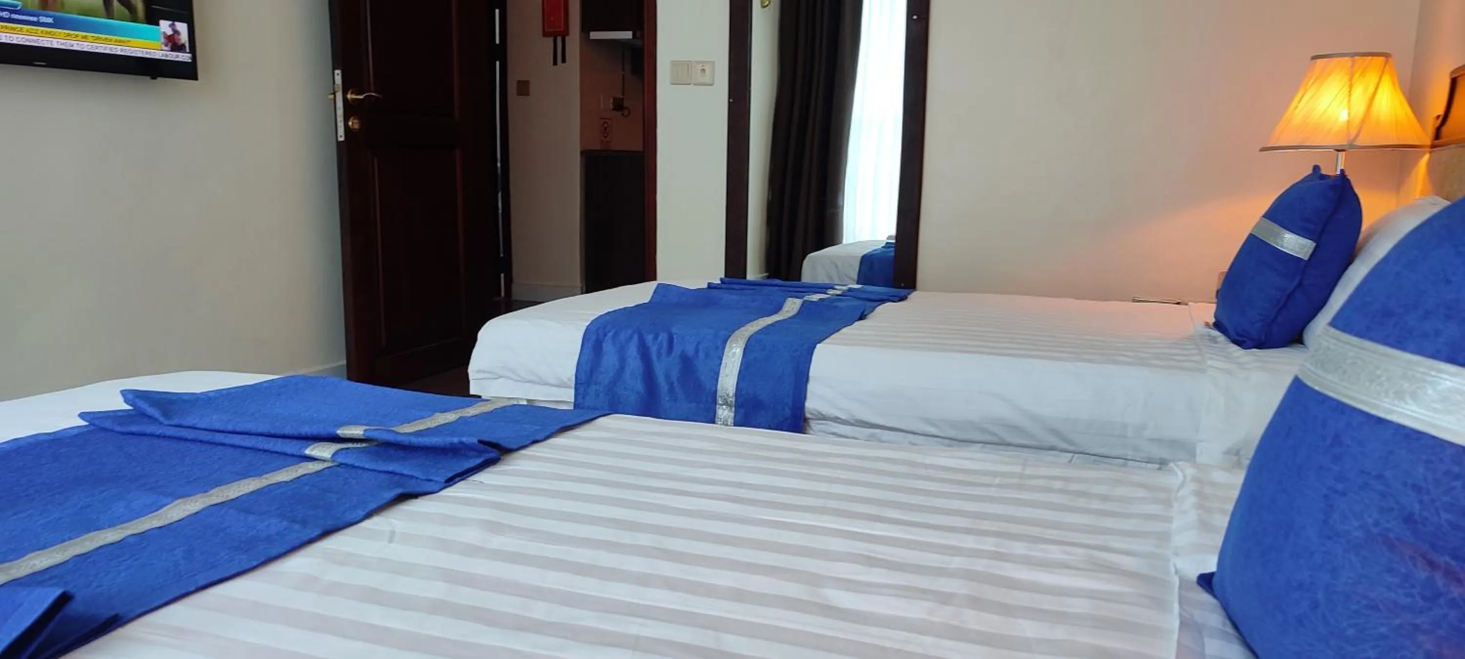Bed in Koki Hotel