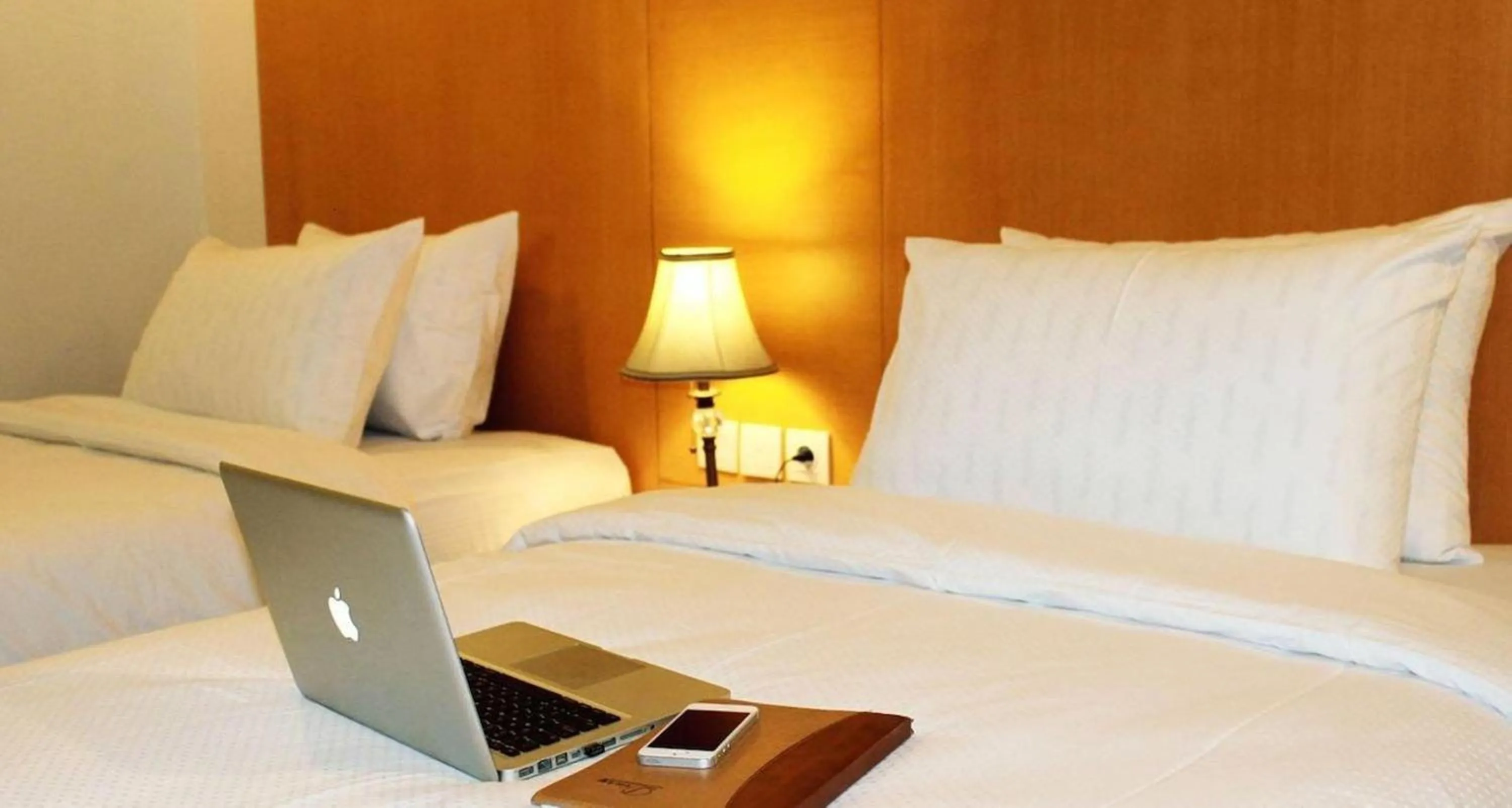 Bed in Grand Asia Hotel