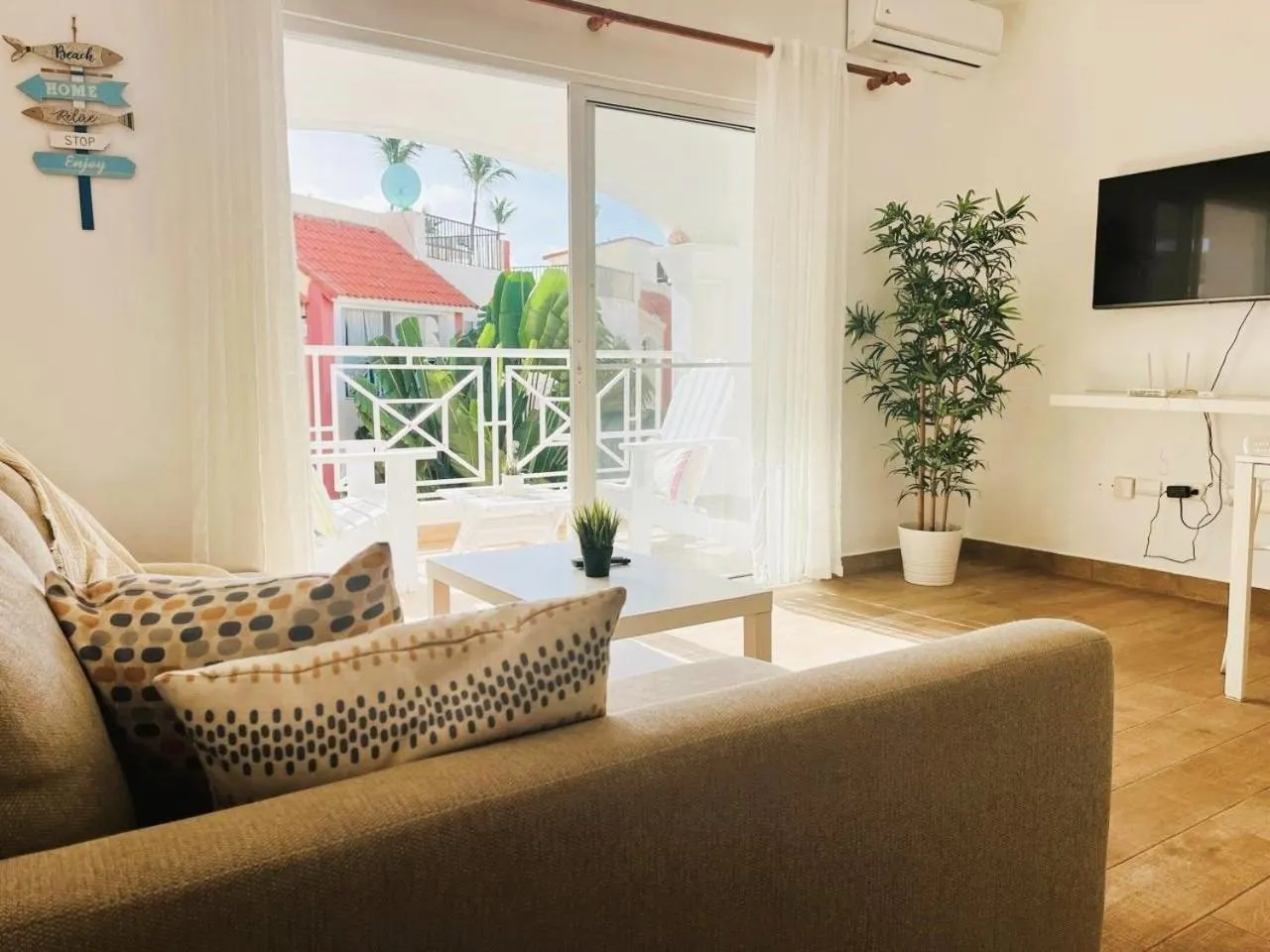 Living room in El Dorado Apartment 1bedroom walking distance from Playa Bavaro