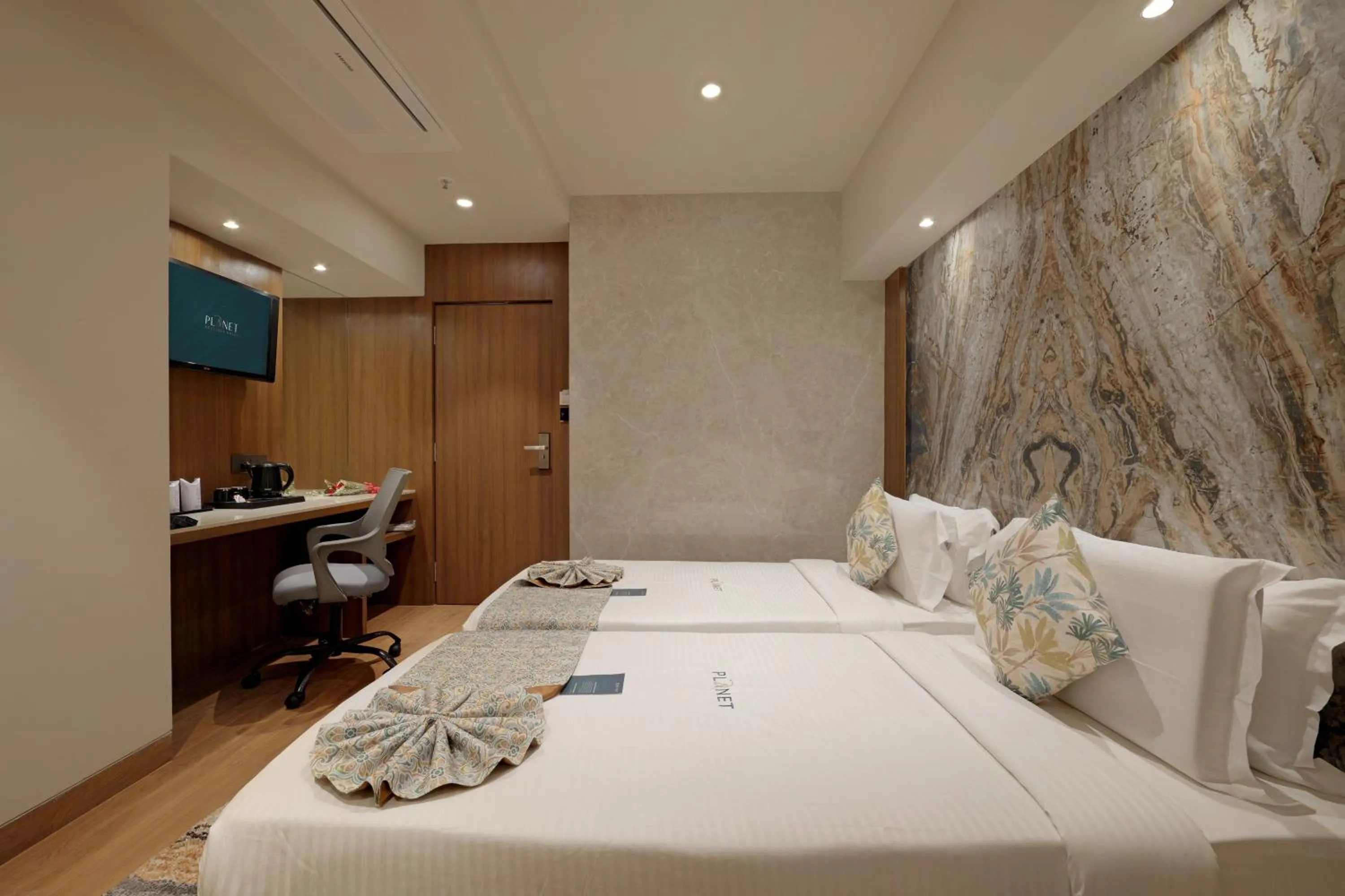 Bed in Planet Boutique Hotel