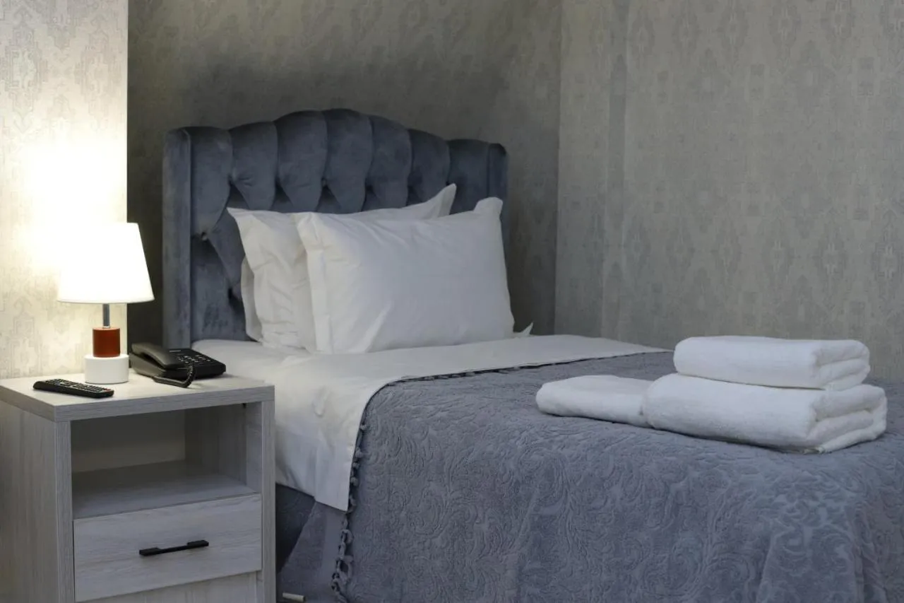 Bed in Renaissance Boutique Hotel