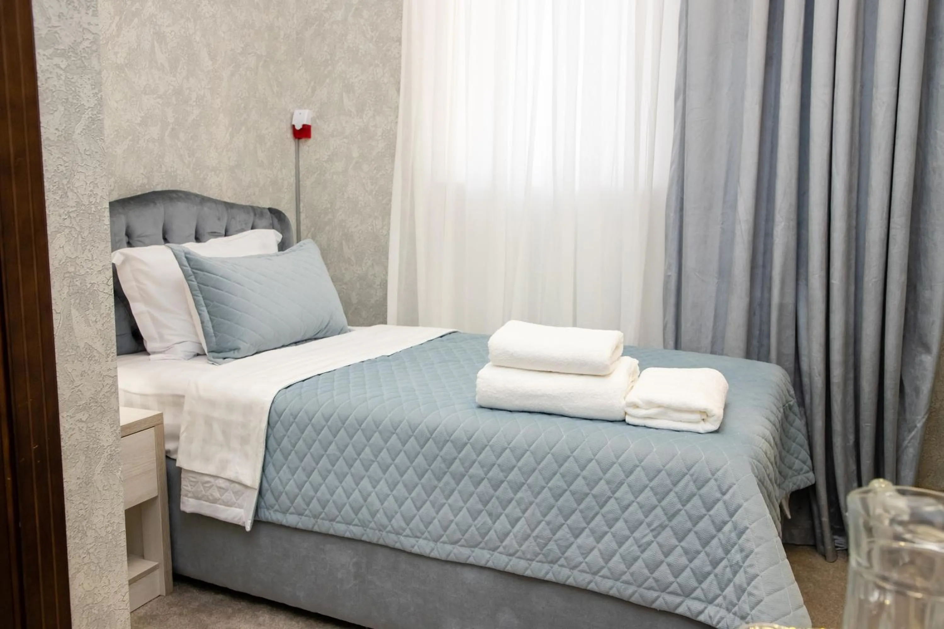 Bed in Renaissance Boutique Hotel