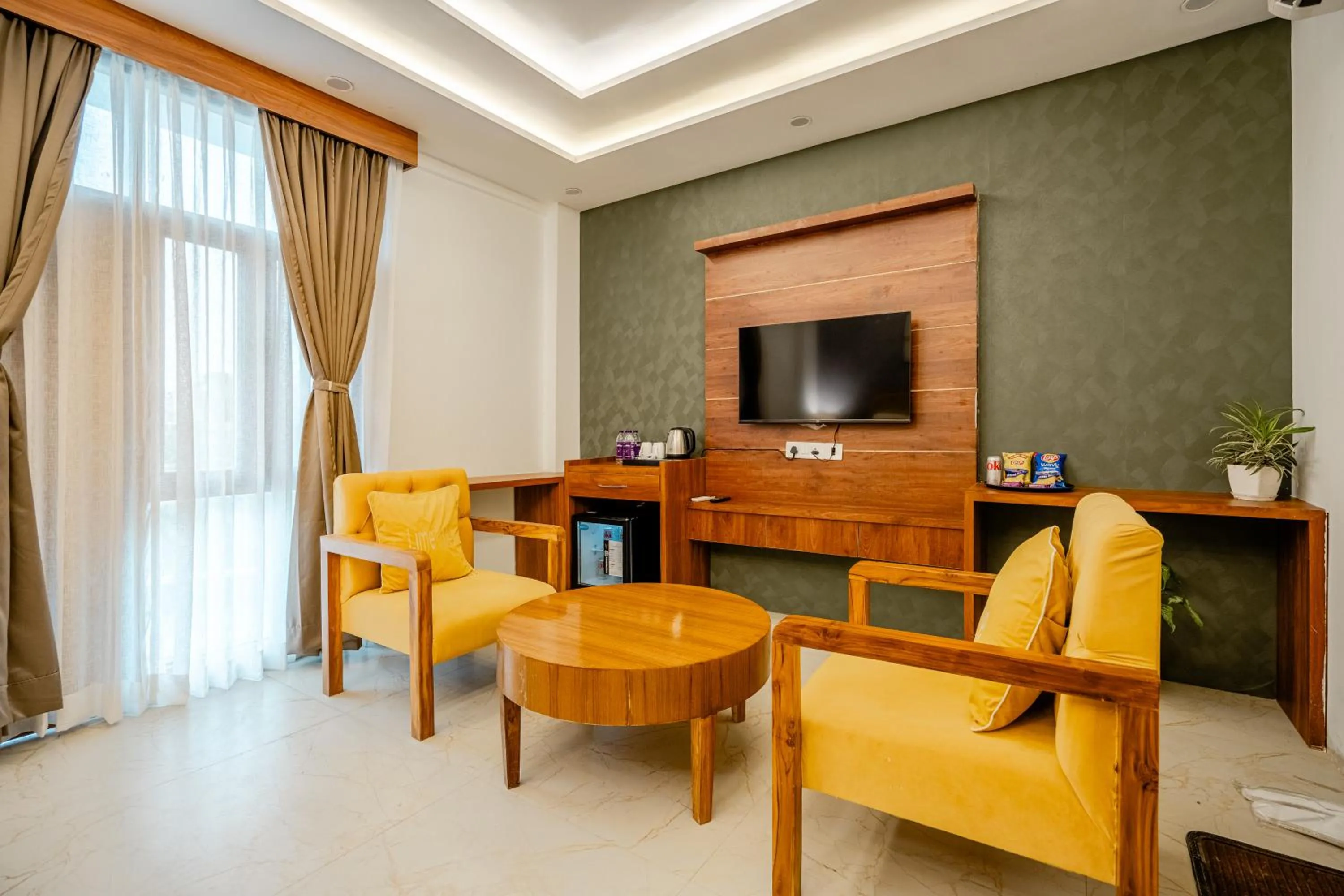 TV and multimedia in Lime Tree Hotels and Banquet Greater Noida