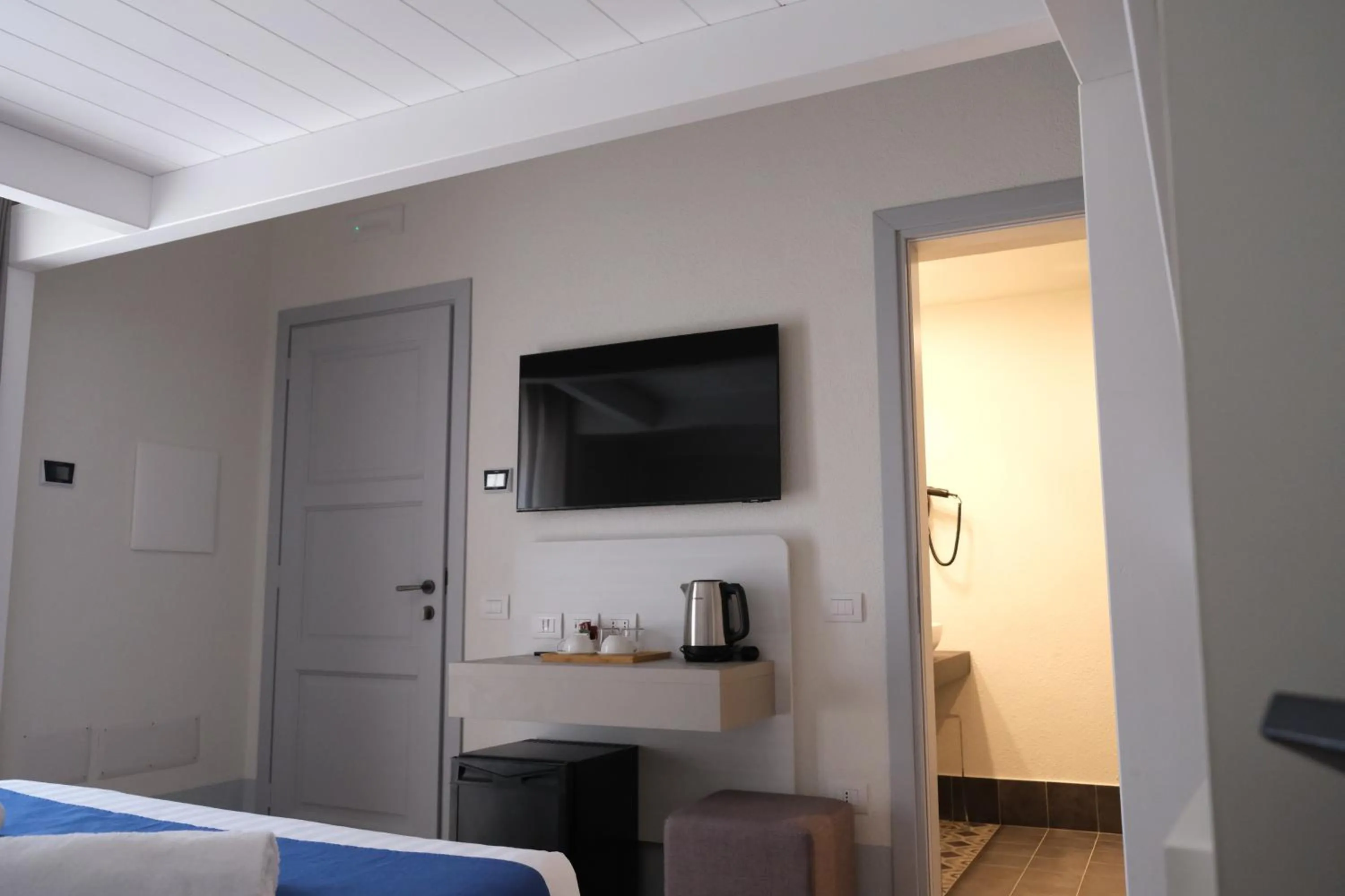 Bed in TANIT ROOMS & SPA