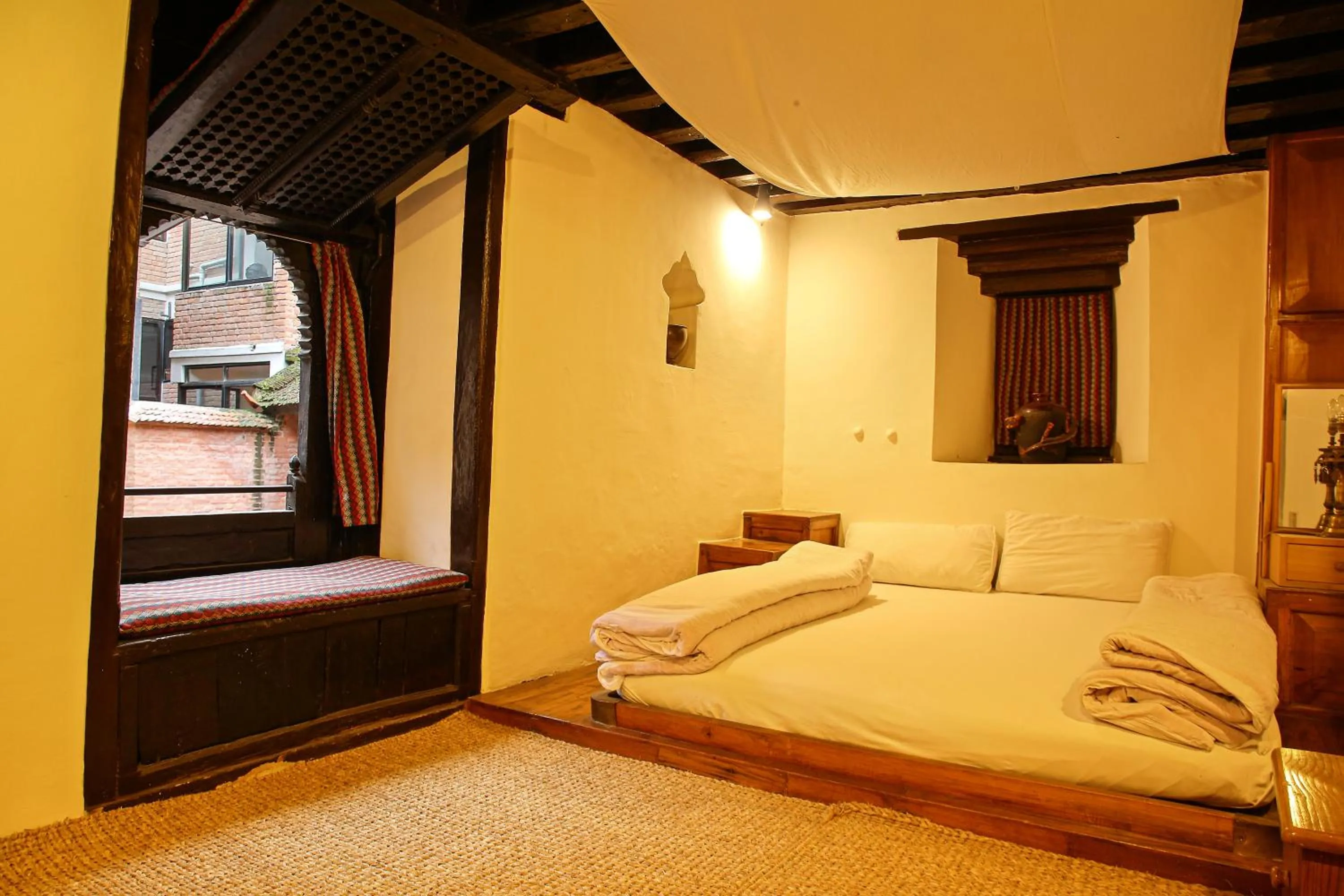 Bedroom, Bed in Newa Chen Historic House UNESCO