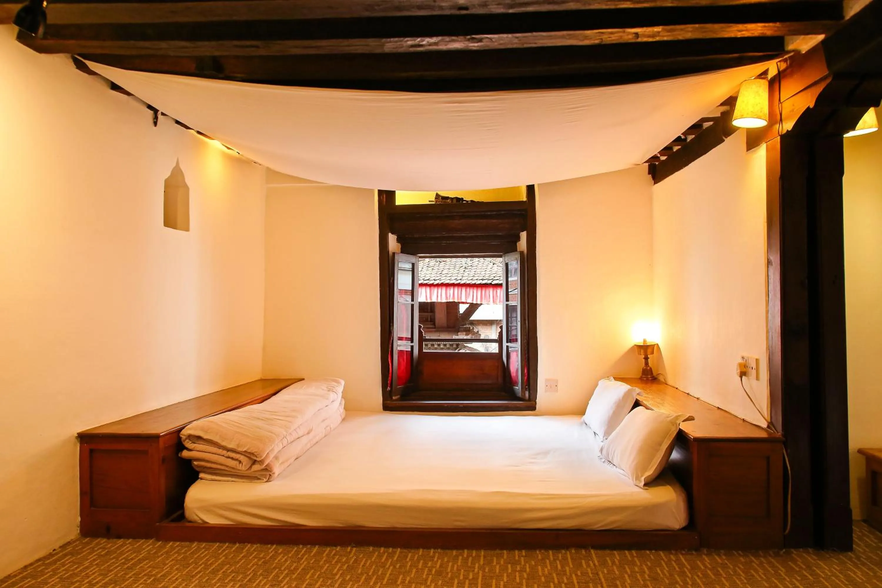 Bed in Newa Chen Historic House UNESCO