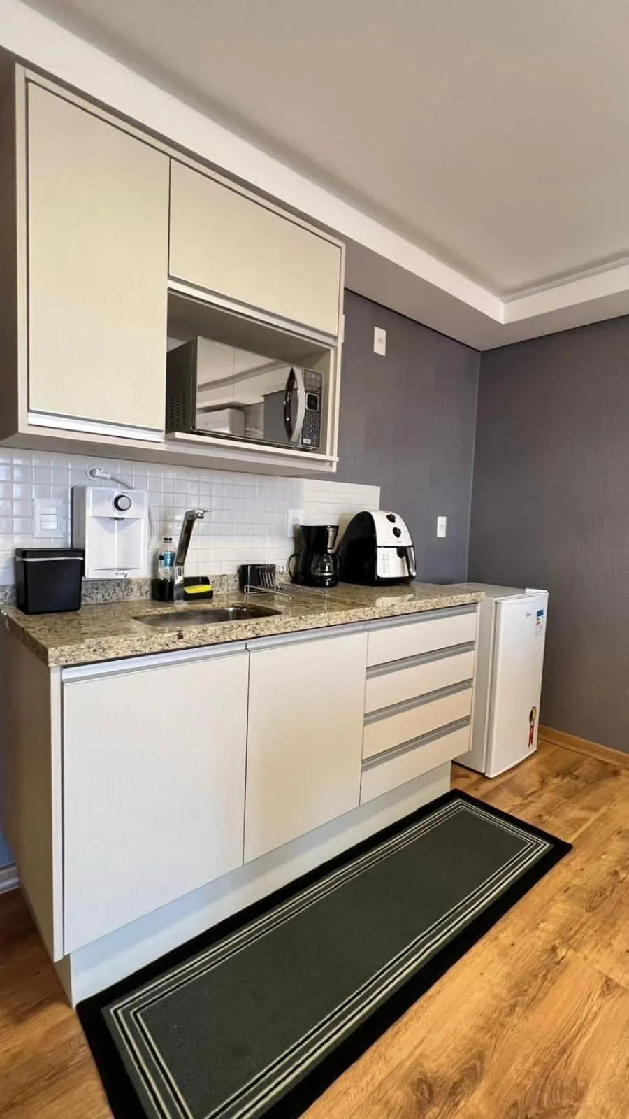 kitchen in Hotel Flat Afonso Pena e Centro de Convenções Campo Grande