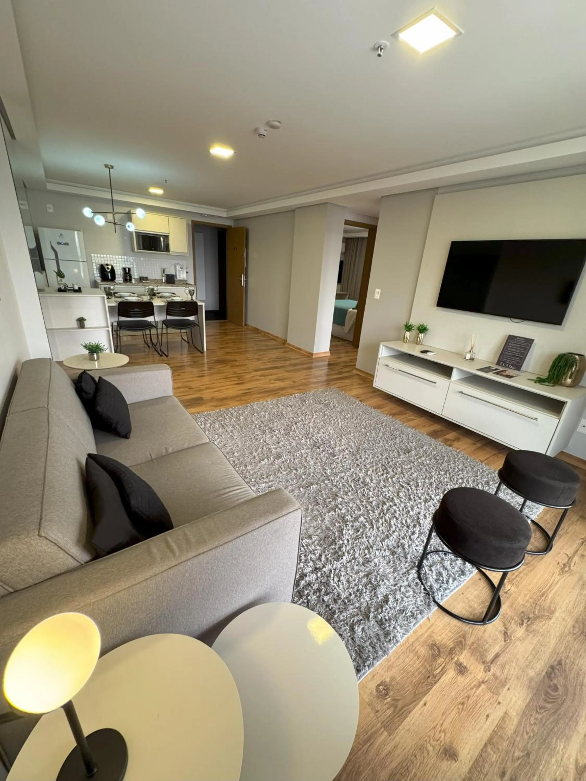 Communal lounge/ TV room in Hotel Flat Afonso Pena e Centro de Convenções Campo Grande