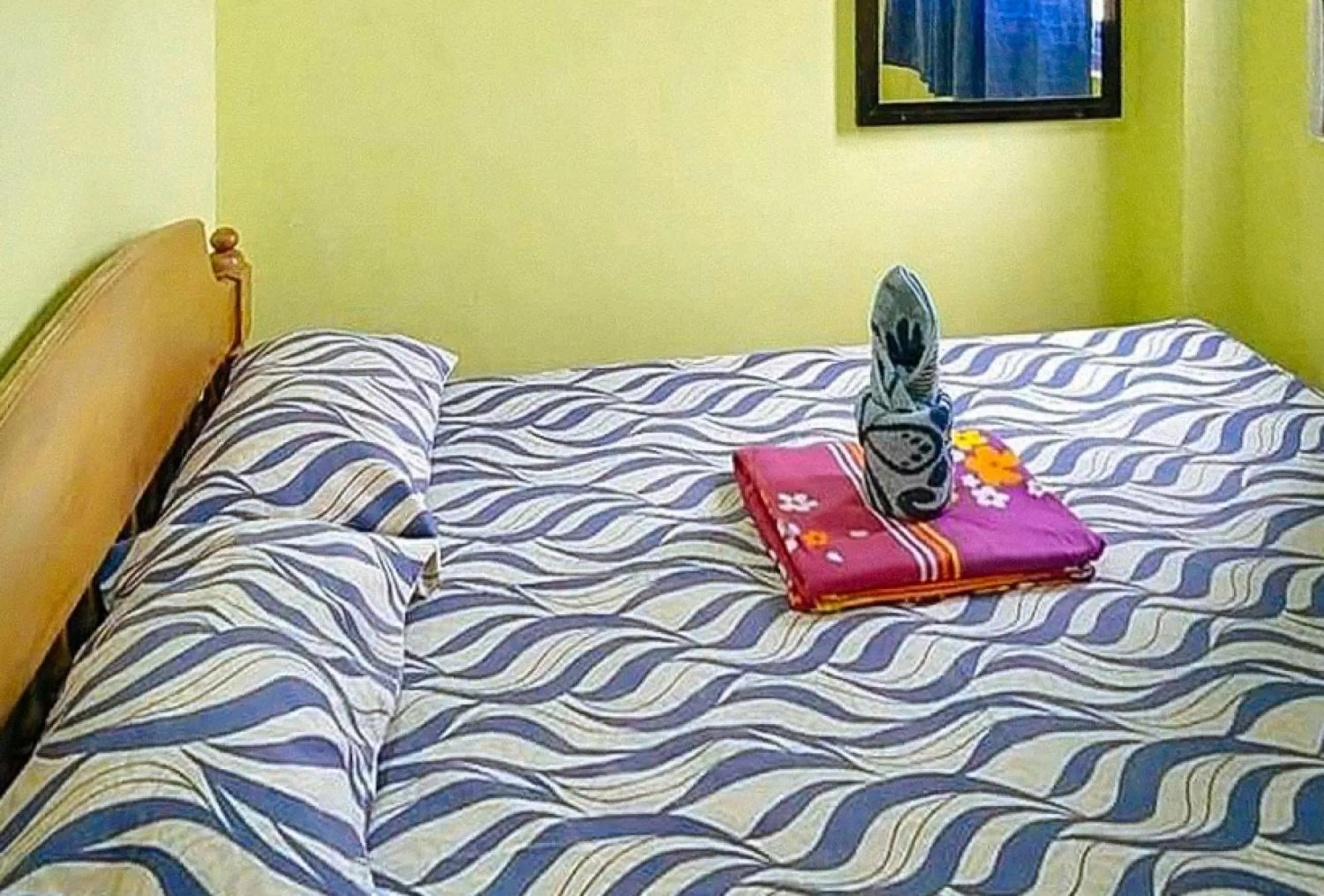 Bed in Livin's Inn Tuguegarao