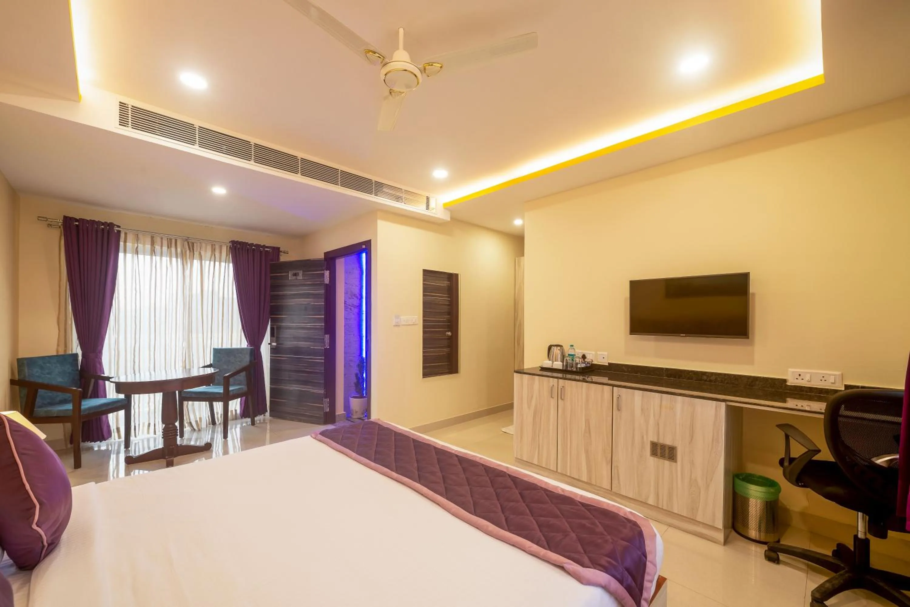 TV and multimedia, Bed in Zenith Hotels Hebbal Bangalore