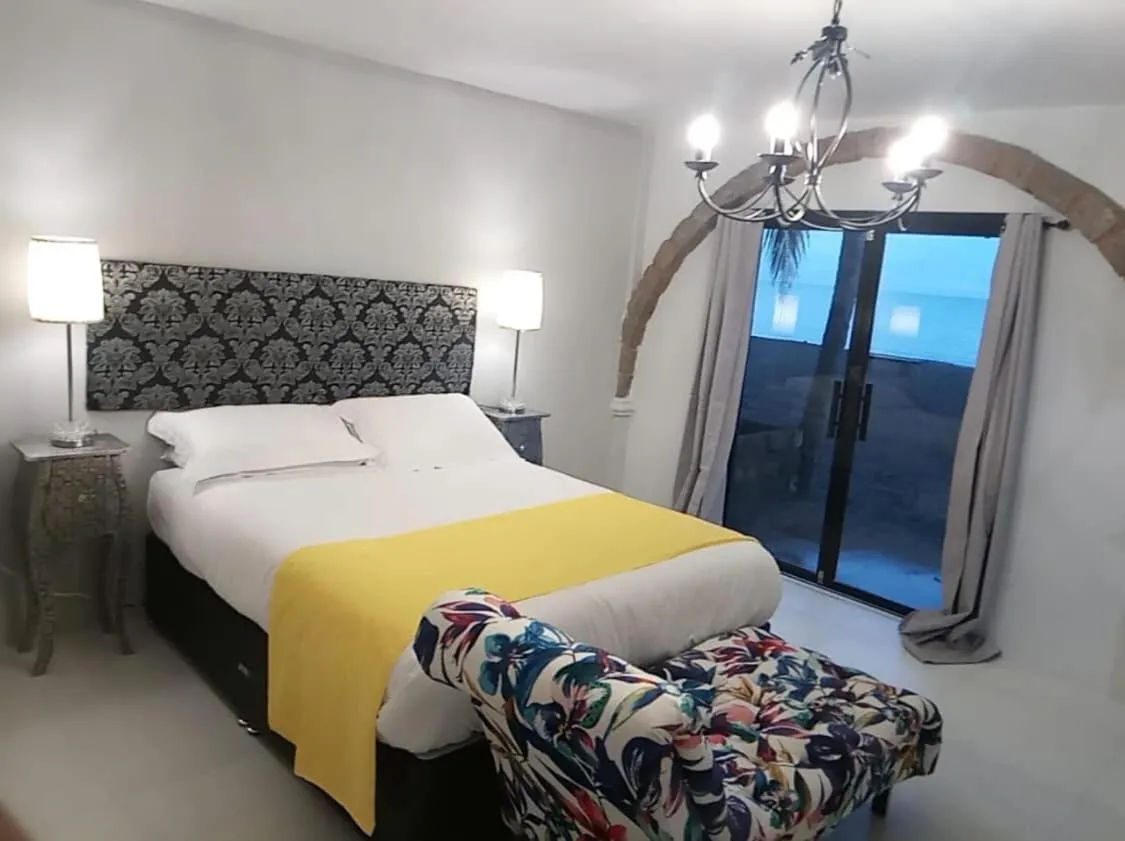 Bed in Sunbloom Beachfront Hotel and Restaurant Zambales