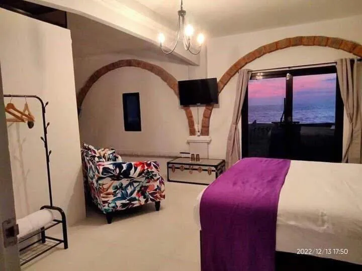 Bed in Sunbloom Beachfront Hotel and Restaurant Zambales