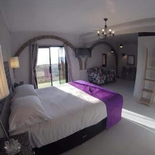 Bed in Sunbloom Beachfront Hotel and Restaurant Zambales