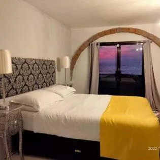 Bed in Sunbloom Beachfront Hotel and Restaurant Zambales