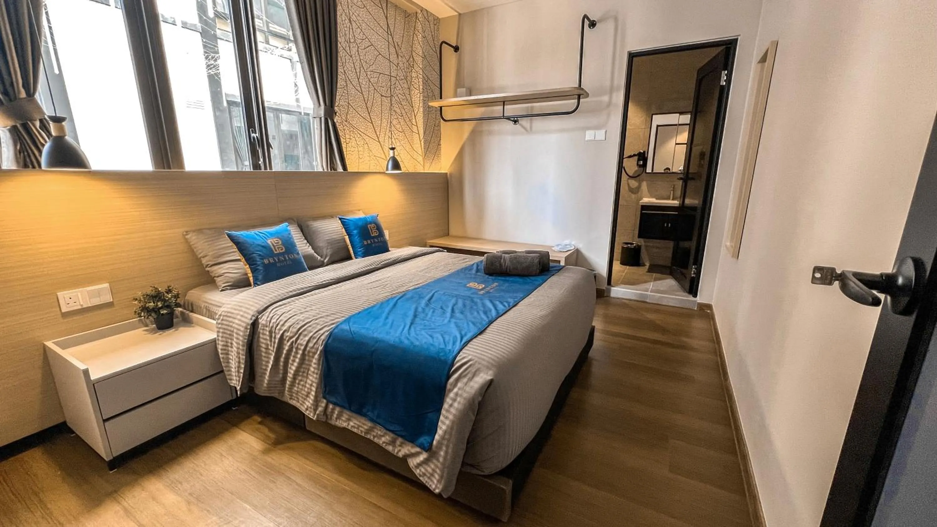 Bed in Hotel Brynton at Cameron Centrum Mall