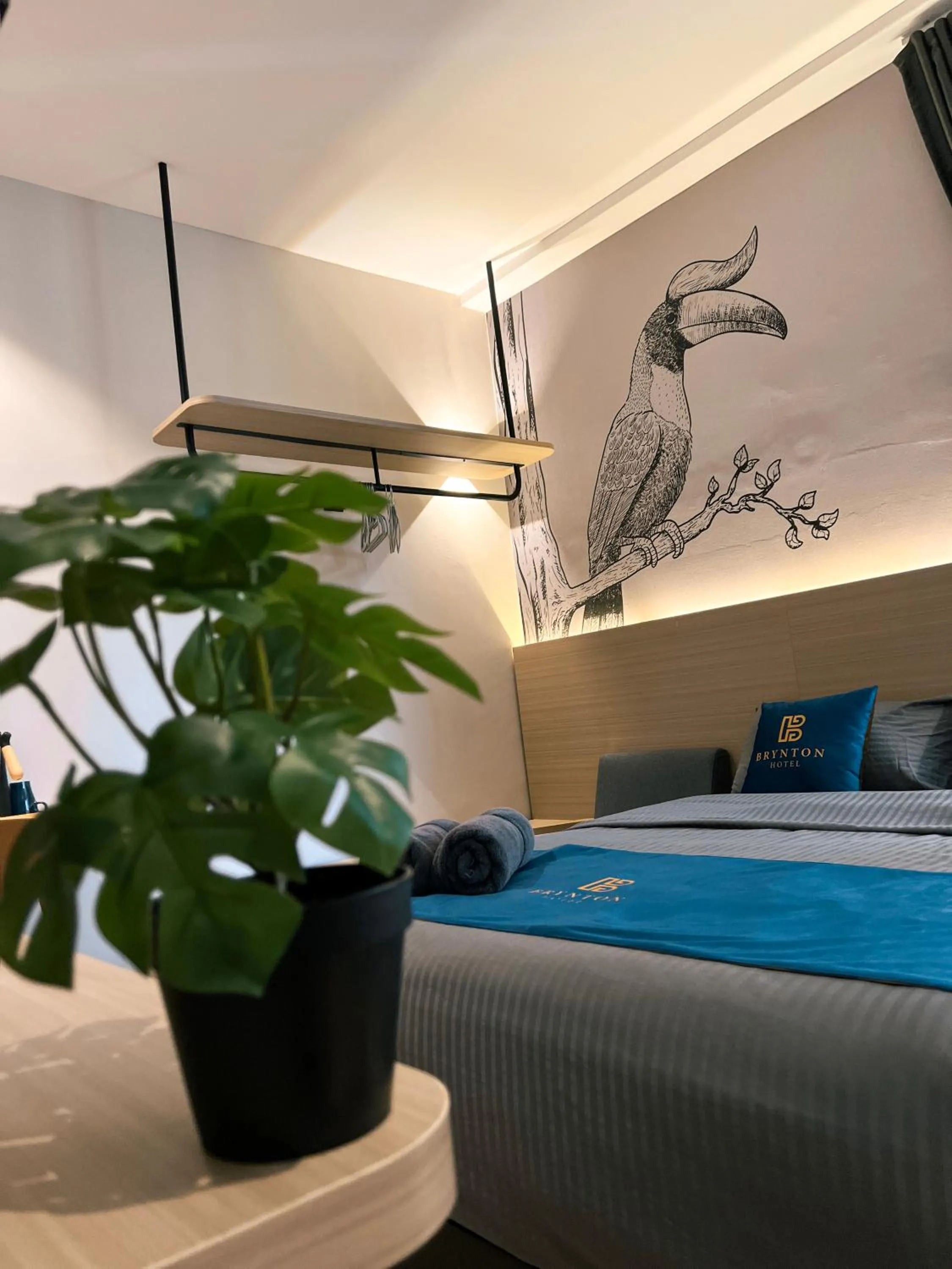 Bed in Hotel Brynton at Cameron Centrum Mall