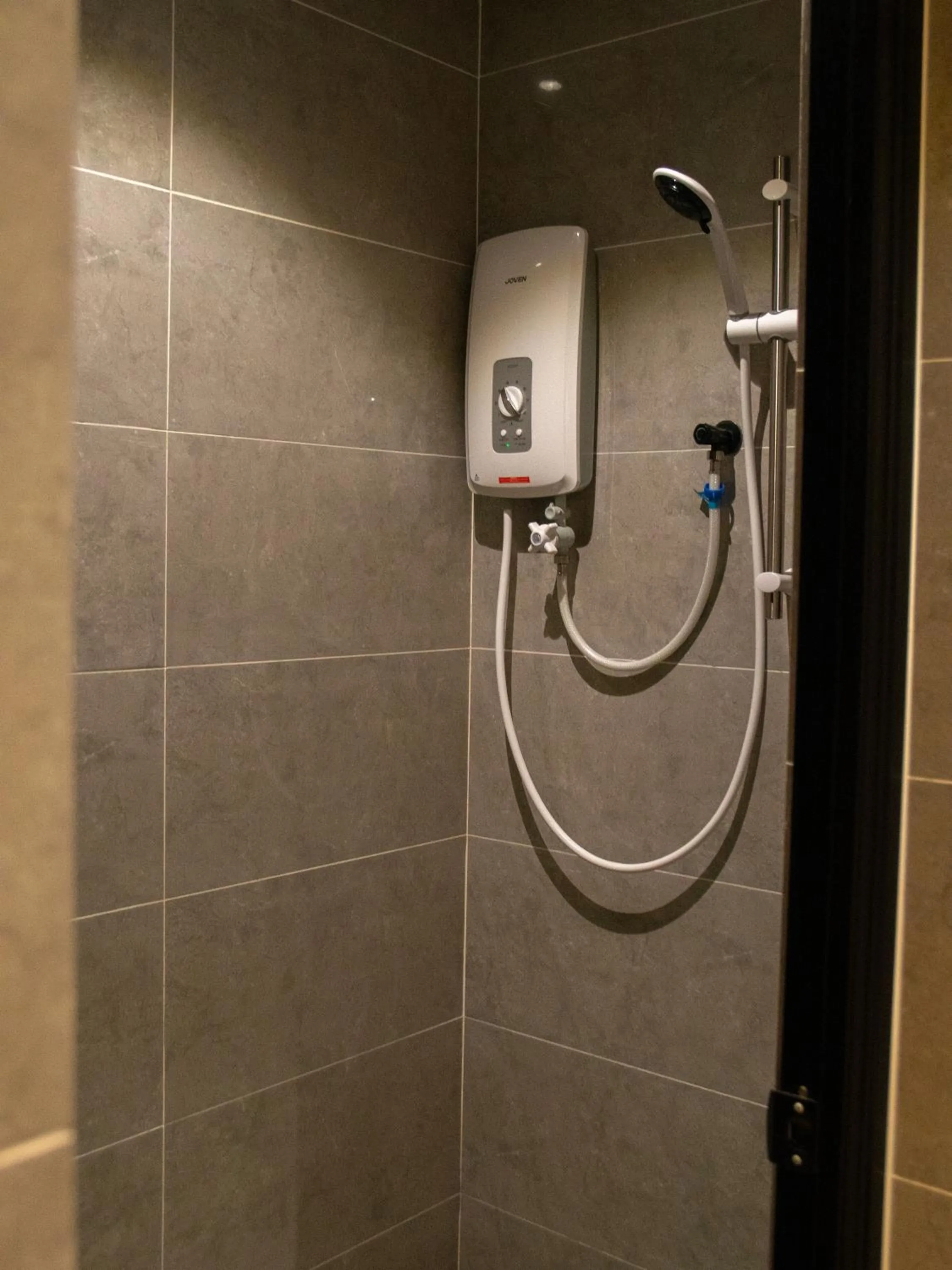 Shower in Hotel Brynton at Cameron Centrum Mall
