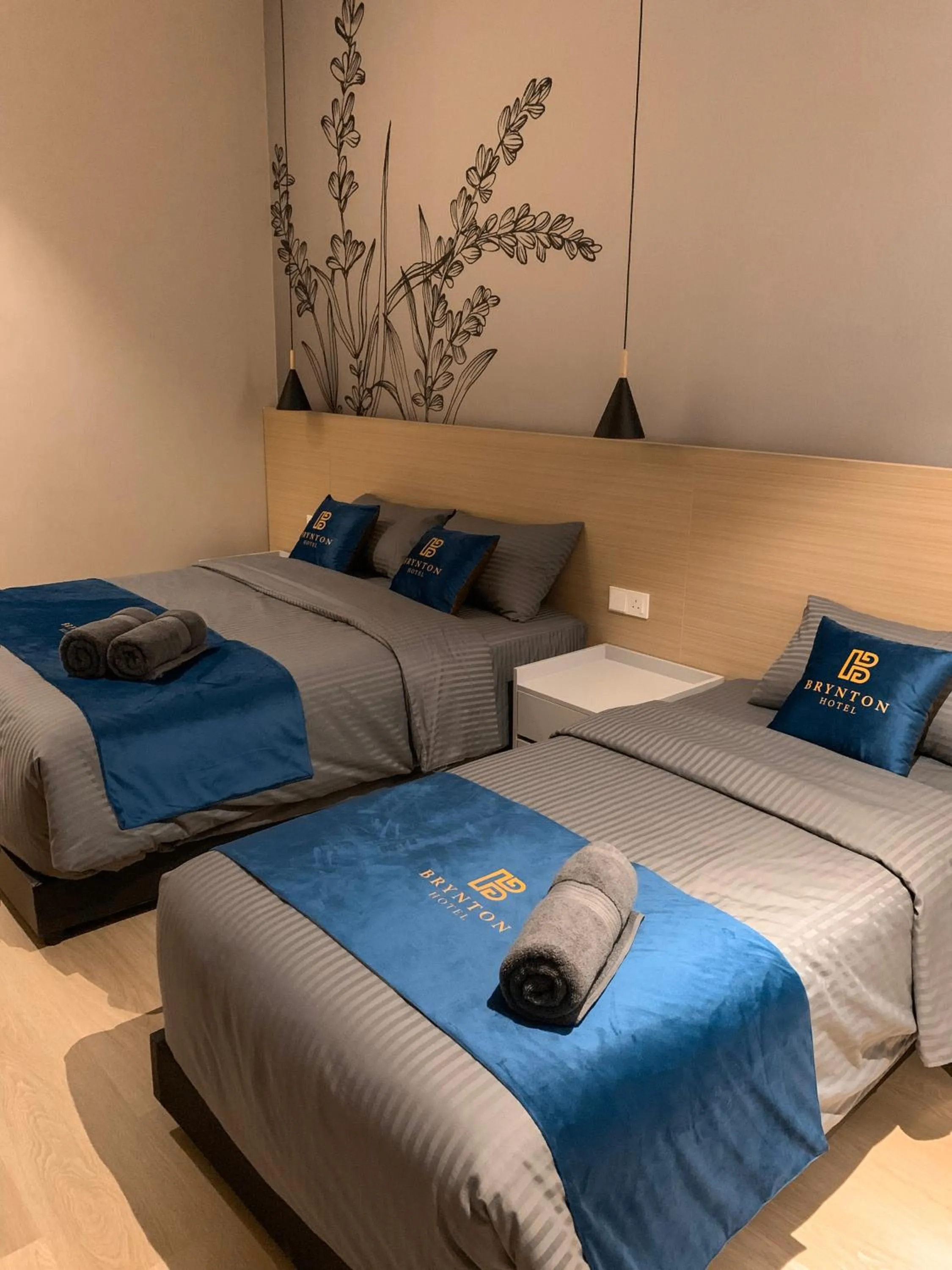 Bed in Hotel Brynton at Cameron Centrum Mall