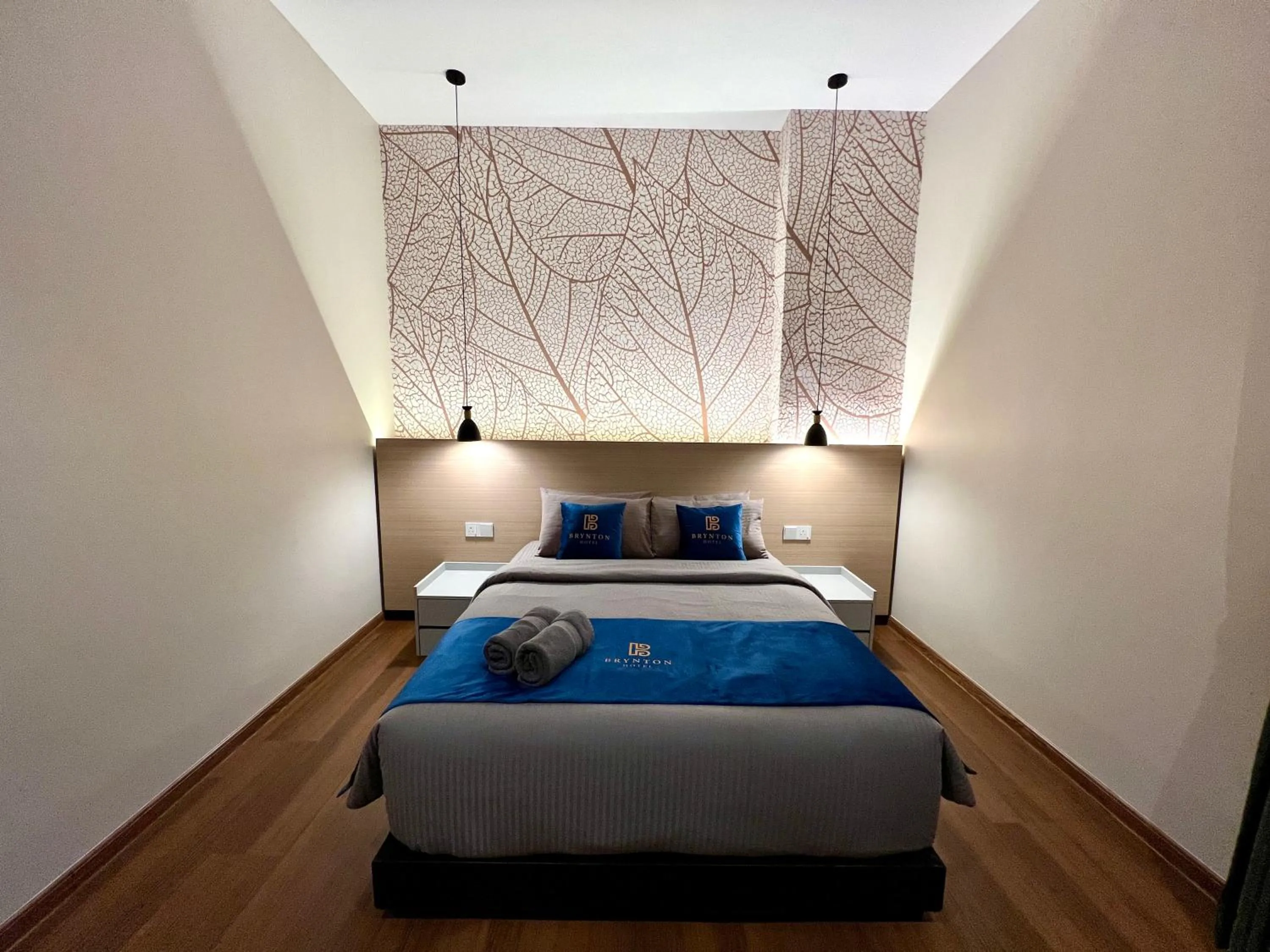 Bed in Hotel Brynton at Cameron Centrum Mall