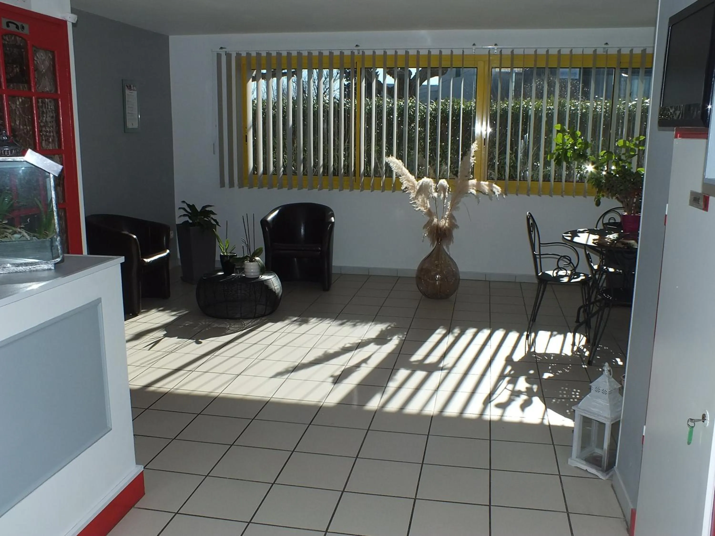 Seating area in Logis hôtel restaurant Le clos saint loup