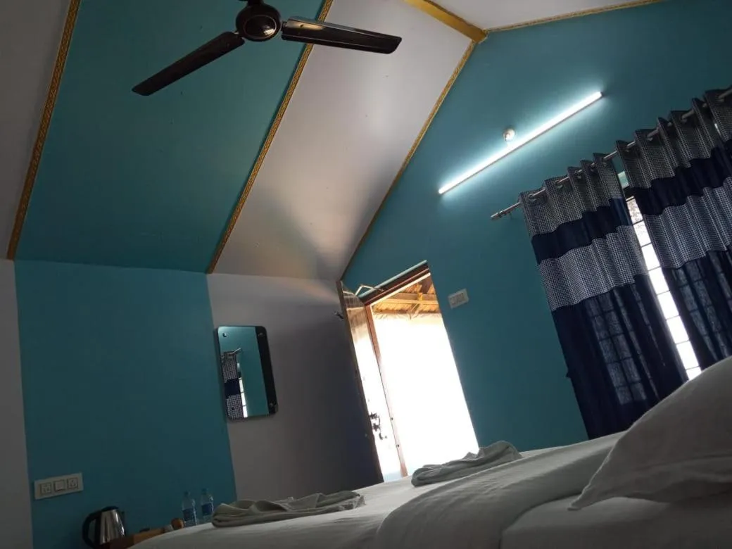 Bed in Poornima Beach Stay