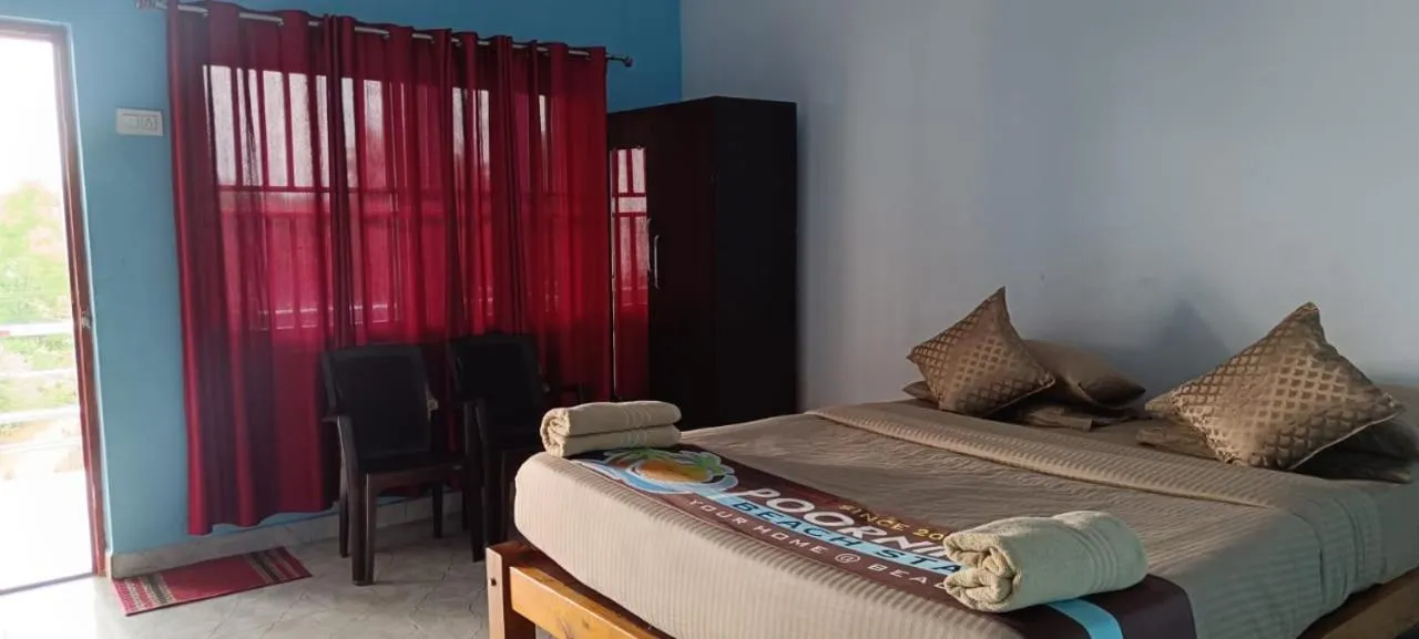 Bed in Poornima Beach Stay