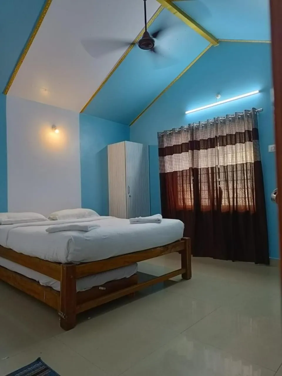 Bed in Poornima Beach Stay