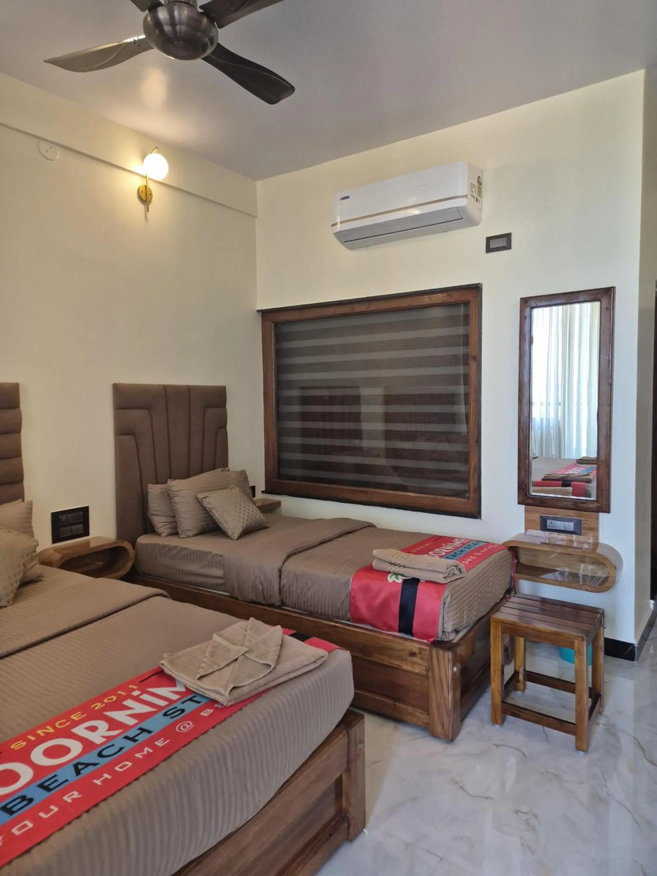 Bed in Poornima Beach Stay