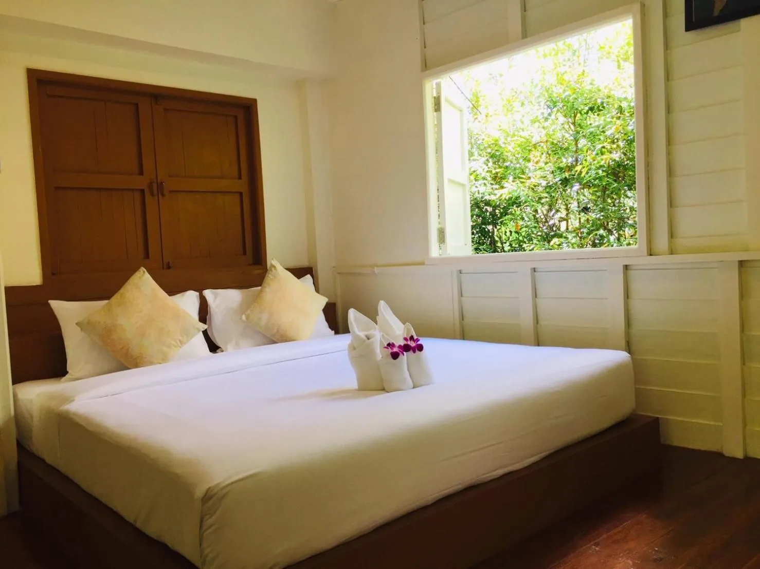 Bed in Baansuan Suksangob Farm Stay