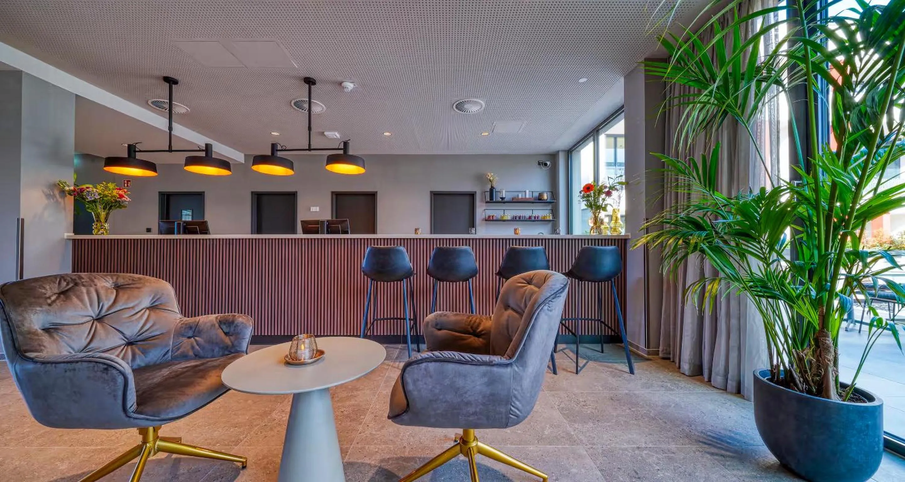 Lobby or reception in PLAZA INN Ulm