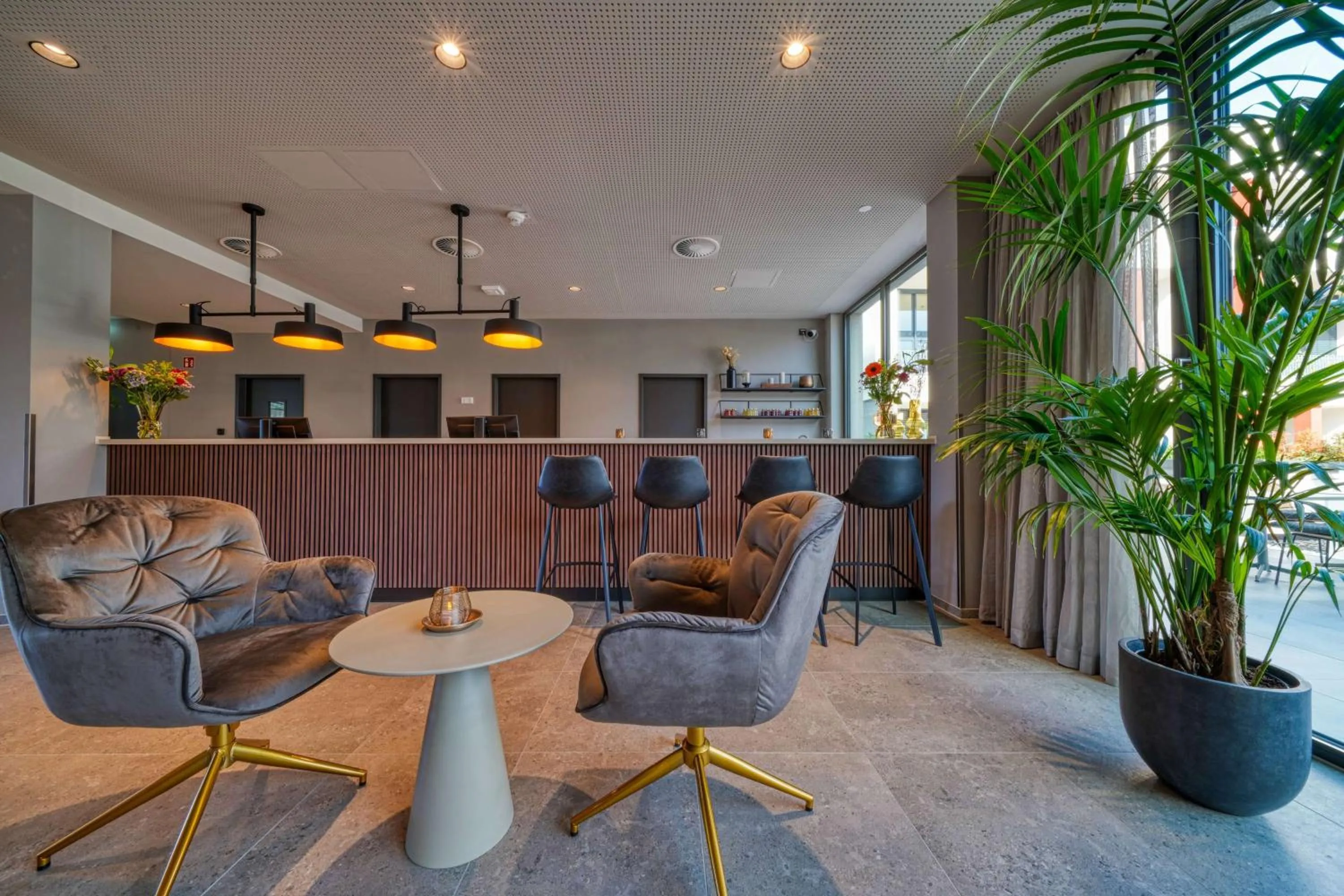 Lobby or reception in PLAZA INN Ulm