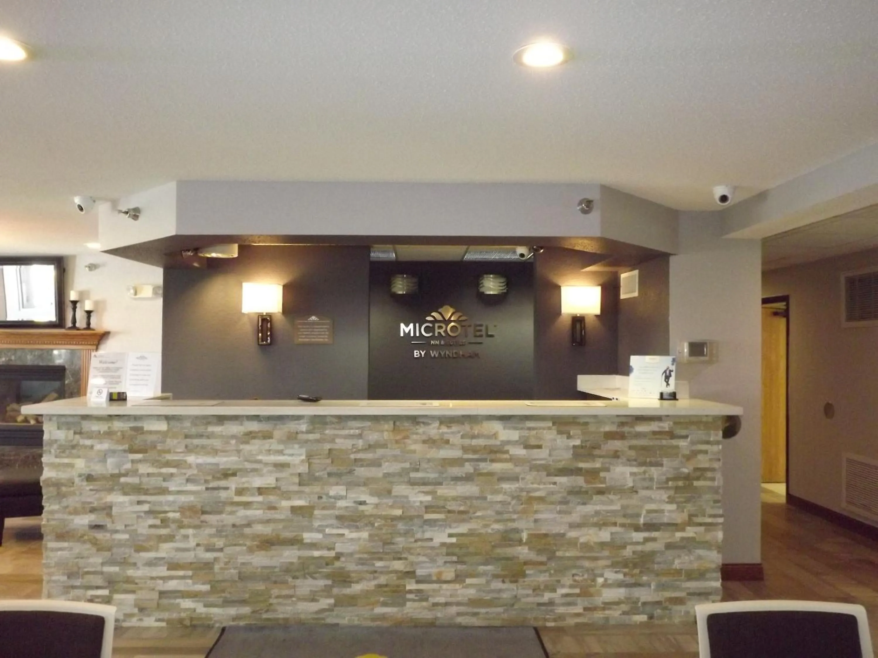 Property logo or sign in MICROTEL Inn and Suites - Ames