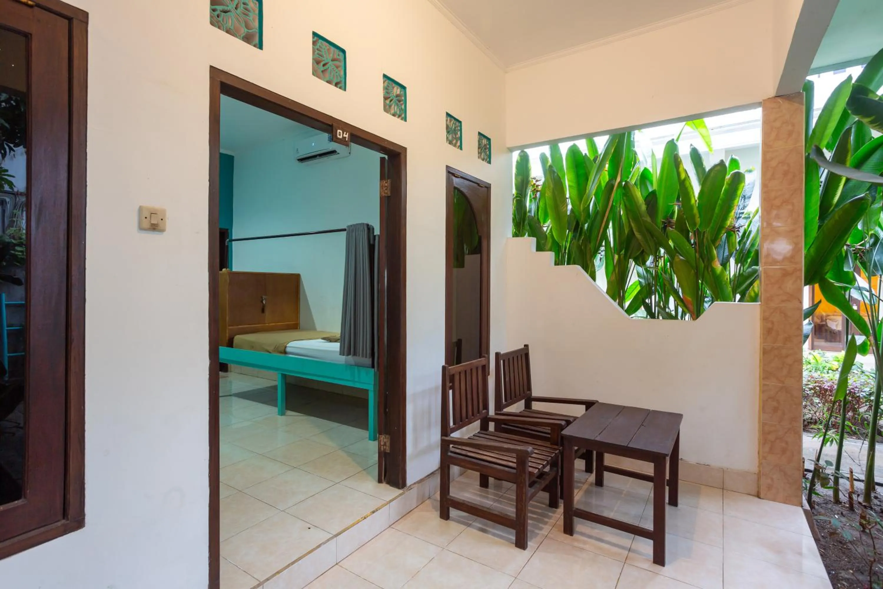 Seating area, Bed in Kidi's Lodge Gilitrawangan