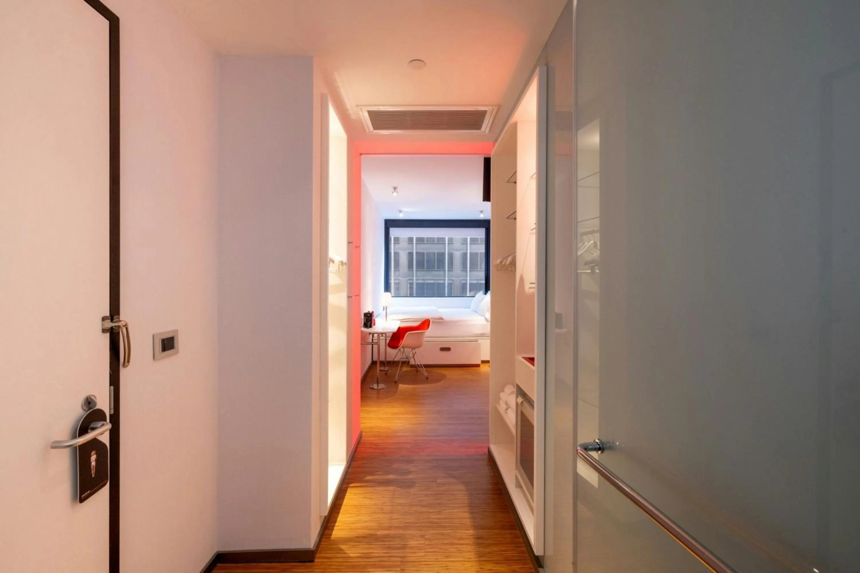 Photo of the whole room, Bed in citizenM New York Times Square