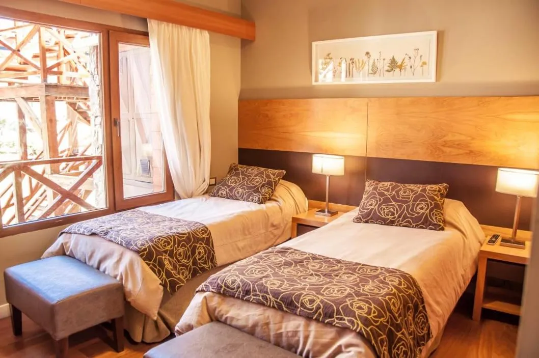 Bed in Los Robles Apart & Spa