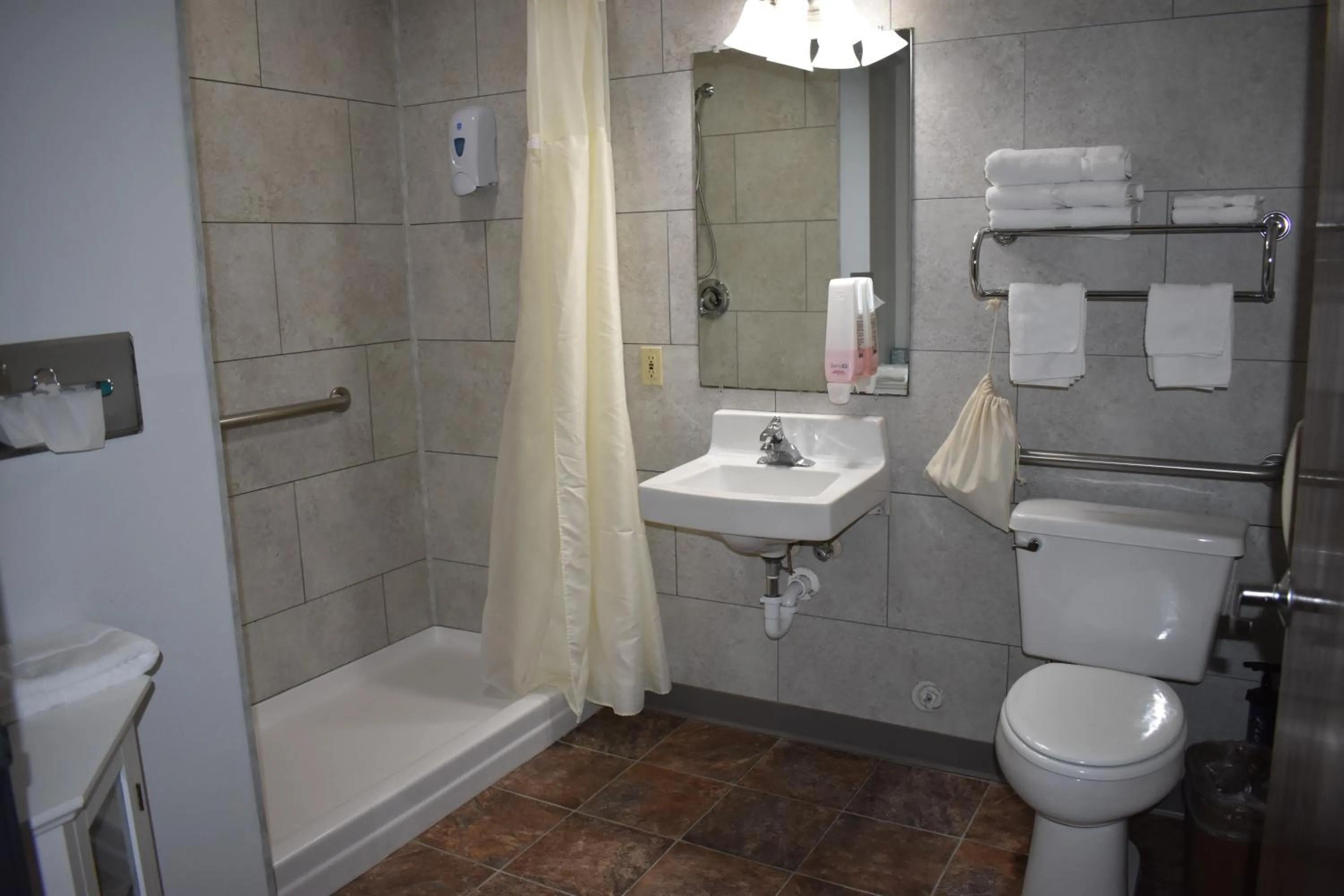 Toilet in Heartland Hotel & Suites