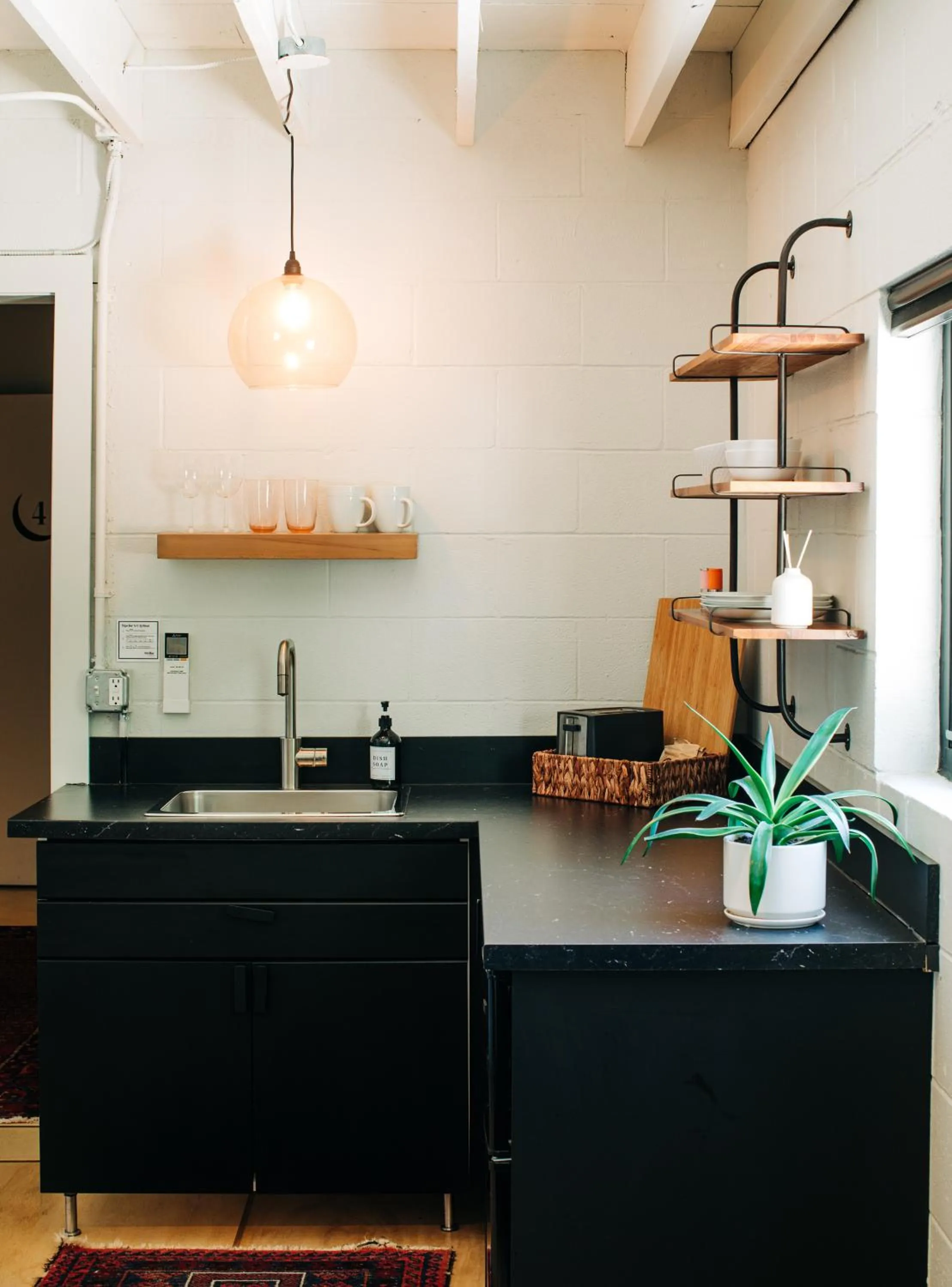 Kitchen or kitchenette in Stellar Suites