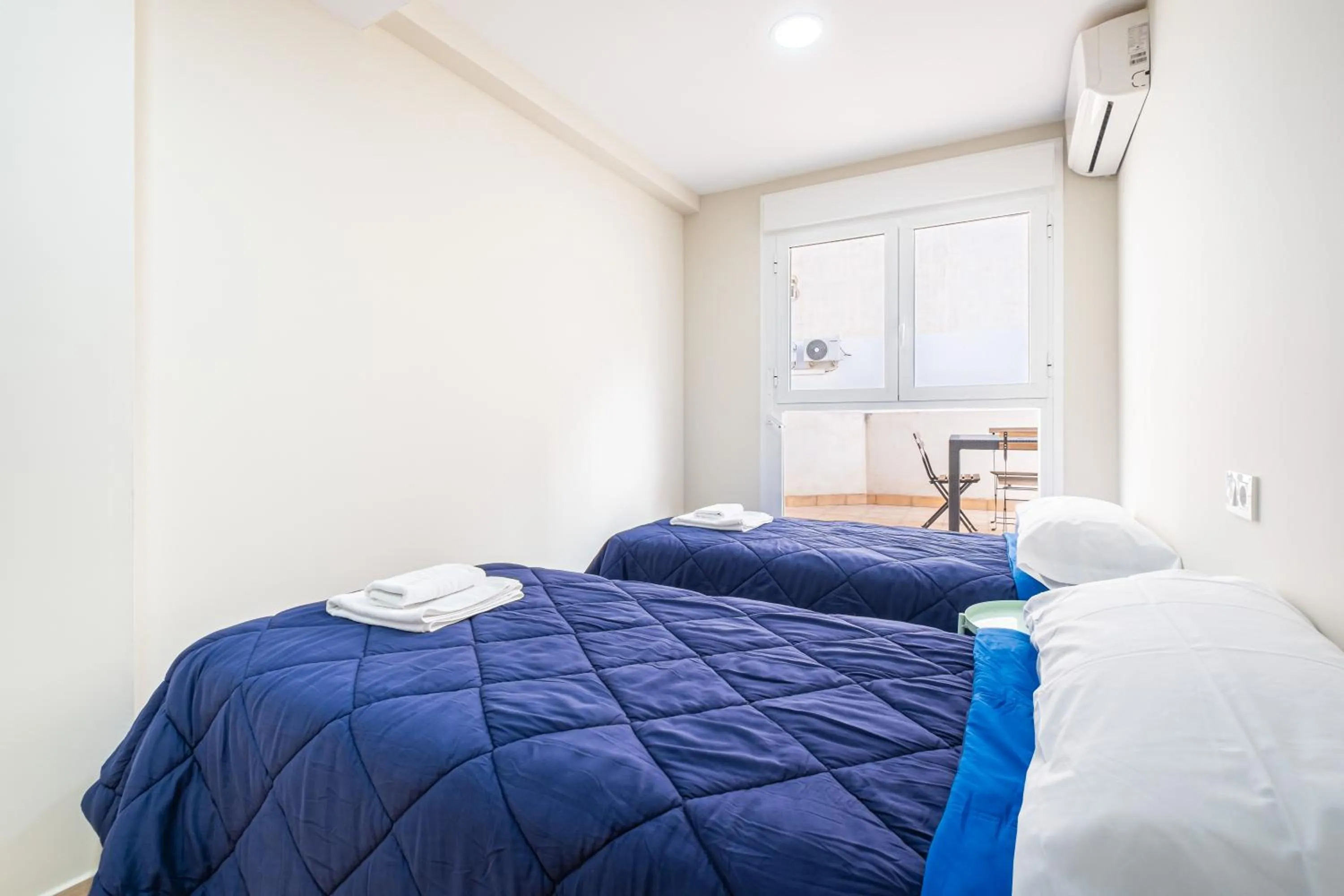 Bed in Apartamentos La Rosita Old Town